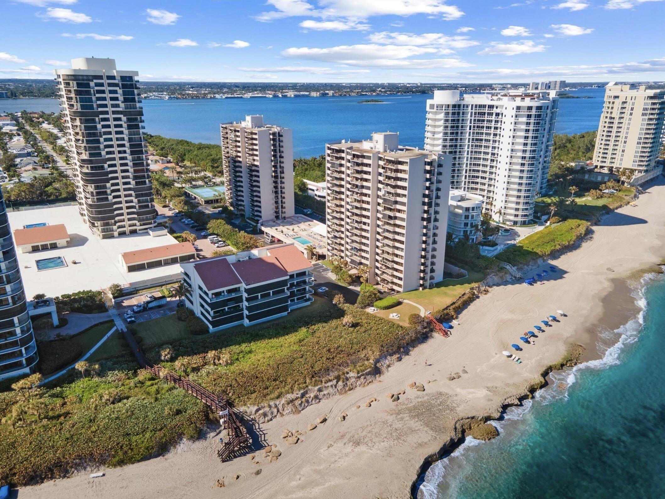 No Assessments and strong reserves, passed milestone inspections, HOA decreasing, amazing management! Priced $100K below Appraised Value! New Roof 2025, Fully Impact, New AC, Fully Renovated! 180 Degrees SE Views! Stunning spacious 2 bed/2 bath condo, everything exquisitely updated and turnkey! Panoramic turquoise water views, light and bright with lots of closet space and designer finishes! The gourmet Kitchen has SS appliances, white shaker cabinets, marble countertops & custom backsplash! The expansive bedroom boast updated walk-in closets and showers w/ stunning stone finishes & designer cabinetry! Welcome to Cote d'Azur, a socially vibrant & luxurious residence on the Exclusive Singer Island Beach Row, coveted prime location for beach goers, bikers, golfers, & boaters! Stunning Southeast exposure!! Walking distance to rests and shops and world class diving!