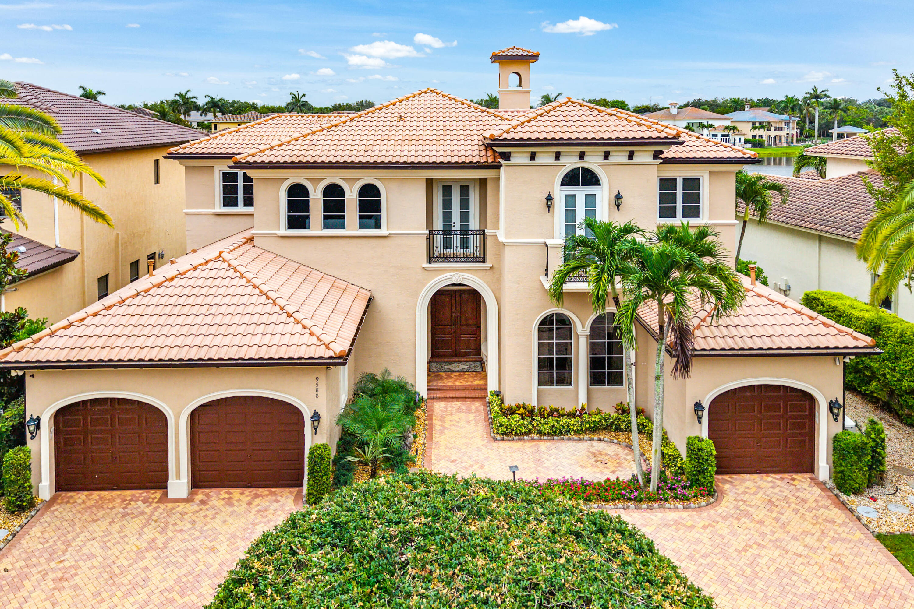 Where lakefront grandeur meets enduring craftsmanship — welcome to this distinguished Balmonte estate in The Oaks. This 4,846 sq ft, 5-bedroom, 5 full & 2 half baths home was built with intention — marble floors with custom inlays, coffered ceilings, exquisite millwork, designer lighting, & a wood-appointed office set an exceptional tone throughout. The refinished gourmet kitchen features double dishwashers & generous counter space. The main-level primary suite frames sweeping wide lake views with dual custom closets, soaking tub, dual vanities, & walk-in shower. A covered summer kitchen, beach entry pool & spa, full hurricane protection, whole-house generator, & 3-car garage — this is lakefront living at its absolute finest. There's no place like The Oaks!! Featuring the widest variety and highest quality amenities, including clubhouse, restaurant and bar, finest racket programs and facilities for all levels and ages including world class tennis and pickleball, stellar fitness facility with a multitude of complimentary classes and instructors including Pilates, Spin, HIIT boot camps, water aerobics, Zumba, Yoga and so much more, Luxurious Spa with face and body treatments, wonderful special events for kids and adults alike, A-rated schools - the Oaks has something for everyone!!