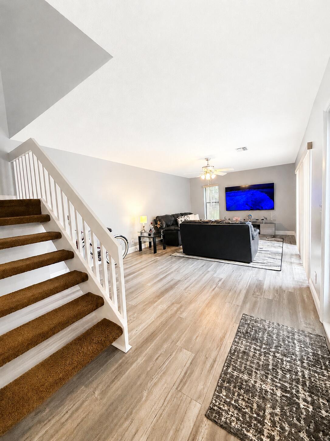 Beautifully updated 2-bedroom, 2.5-bath townhouse nestled in a peaceful, lushly landscaped, and impeccably maintained community. Enjoy an exceptional lifestyle with resort-style amenities including a clubhouse, fitness center, swimming pool, theater, racquetball courts, golf, and much more. This well-maintained home features a private fenced patio and a convenient storage room.  Recent upgrades provide peace of mind, including a brand-new roof being installed this month, A/C replaced in 2022, new water heater, new appliances, renovated kitchen, fresh interior and exterior paint, and new flooring throughout the first floor. Ideally located near shopping, dining, parks, and major highways, this move-in-ready residence offers the perfect combination of comfort, convenience, and community livi