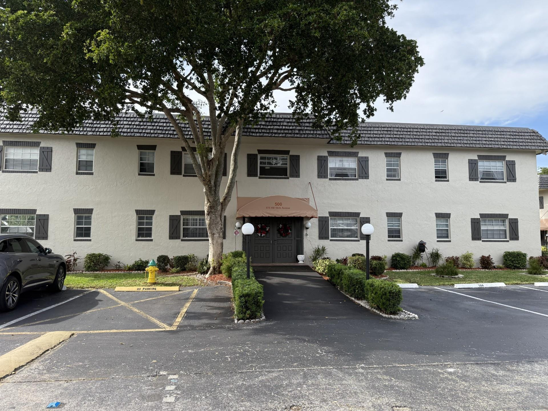 Nicely furnished first-floor corner unit featuring walk-in closets and en-suite bathrooms in both bedrooms. The Florida room has newer windows and a door providing quick access to the clubhouse. Located in a well-maintained community offering amenities such as a pool, tennis courts, shuffleboard, a BBQ area, and washer/dryer usage included in the monthly fees. Conveniently close to shopping, restaurants, grocery stores, and transportation. The building has successfully completed its 50-year inspection.