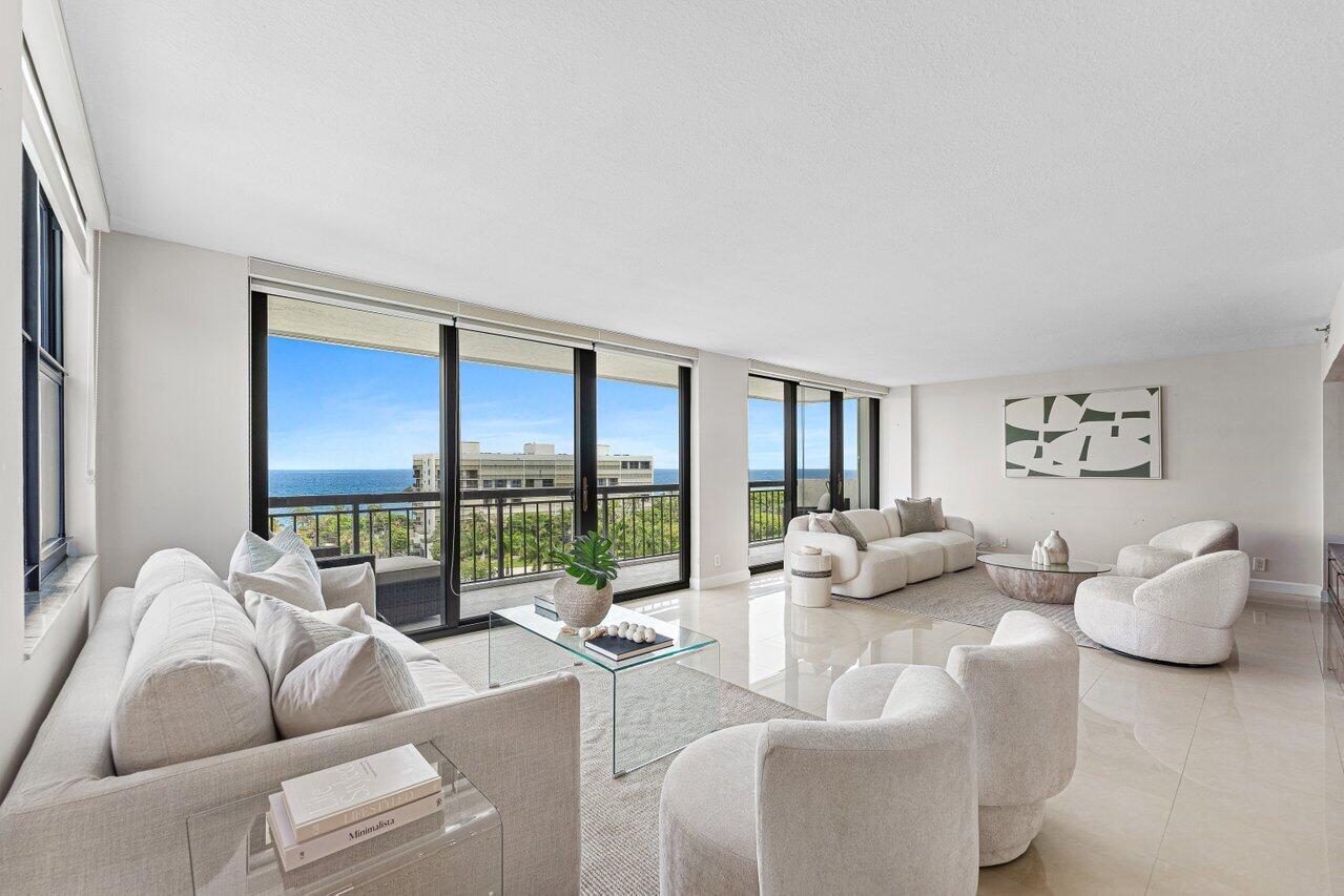 Enjoy sweeping Ocean views from almost every room in this spacious 3-bedroom, 2.5-bath residence in the highly desirable North Tower at La Fontana. Offering 2,038 square feet of living space, this light-filled home features floor-to-ceiling hurricane-impact sliding glass doors, large impact windows, and an expansive balcony perfectly positioned to capture Ocean breezes and panoramic views.  The thoughtfully designed floor plan offers generous living and dining areas, abundant natural light, and exceptional views throughout. Originally configured as a true 3-bedroom residence, the third bedroom has been opened to create a spacious den or family room, enhancing the flow of the home while offering the flexibility to easily convert back to a private third bedroom if desired. The spacious eat-in kitchen offers abundant cabinetry, generous counter space, and a bright breakfast area surrounded by natural light. A private second balcony extends from the kitchen, creating the perfect setting for morning coffee while enjoying Ocean breezes and tranquil views. Adjacent to the kitchen, the open den and family room provide an inviting gathering space that flows seamlessly with the main living areas, creating an ideal setting for both everyday living and entertaining.  The primary suite features a large custom walk-in closet and a beautifully updated marble bathroom with dual vanities, a glass-enclosed shower, and a soaking tub. Additional highlights include a renovated guest bathroom, tile flooring throughout, ample storage, and move-in-ready condition.  New AC and hot water tank installed in 2025!  La Fontana is situated on 10 acres between the Atlantic Ocean and Lake Wyman and offers one of Boca Raton's most unique waterfront lifestyles. Residents enjoy private beach access, boat facilities, a resort-style pool area, tennis and pickleball courts, fitness centers, underground parking, 24-hour security, and beautifully maintained grounds.  For added peace of mind, La Fontana has completed its concrete restoration project, impact protection is in place, reserves are well funded, and there are currently no special assessments.  Surrounded by Ocean Strand Park, Spanish River Park, Red Reef Park, and Gumbo Limbo Nature Center, this exceptional location places you minutes from Downtown Boca Raton, Mizner Park, world-class dining, shopping, golf, and some of South Florida's most beautiful beaches.  A rare opportunity to own one of La Fontana's most desirable and versatile floor plans while enjoying the very best of the Boca Raton waterfront lifestyle.