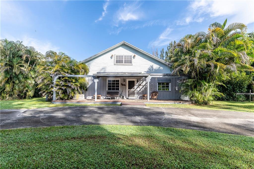 OVERSIZED 1.2 ACRE LOT! 4BR/2.5BA COUNTRY ACRE POOL HOME TUCKED AWAY AT THE END OF A DEAD END STREET IN DAVIE'S DESIRABLE HORSE COUNTRY! CHICAGO BRICK FIREPLACE, NEUTRAL TILE FLOORS,LIVING,DINING,EAT IN KITCHEN & SNACK BAR OFFER WARM, COZY SOCIAL SPACES. AMPLE MASTER WITH WALK-IN CLOSET, SPLIT FLOOR PLAN, LARGE LOFT & BIG BEDROOM UPSTAIRS+1/2 BATH-CAN EASILY BE FULL BATH(SHOWER CURRENTLY NOT IN USE) ENCLOSED SUN ROOM, 2 SPLIT CENTRAL A/C'S, DOWNSTAIRS UNIT FEW YEARS OLD,ROOF APPROX 2002,OUT-BUILDINGS FOR HORSES&WORKSHOP NEED REPAIR. HUGE CONCRETE CIRC. DRIVE, PEACEFUL CANAL RUNS NORTH/SOUTH ON E. SIDE. PRIVATE ACRE IS A BEAUTIFUL SANCTUARY. HUGEPOTENTIAL,PRICED ACCORDINGLY!MILES OF DAVIE'S RECREATIONAL TRAIL SYSTEM, EXC SCHOOLS-COUNTRY ISLES ELEM IN WESTON. HURRY-WONDERFUL OPPORTUNITY! THE TOWN OF DAVIE VACATED HALF OF THE CANAL PLUSTHE 50 FOOT EASEMENT AT THE EAST SIDE OF THE PROPERTY IN 2003.DOCUMENTS FROM THE TOWN OF DAVIE AS WELL AS THE SURVEY ARE IN THE ATTACHMENTS.THE 50 FOOT EASEMENT ADDED 15,250 SQ FT TO THE ORIGINAL LOT OF 37,368 SQ FTCREATING A TOTAL OF 52,616 SQ FT DRY LOT (APPROX 1.2 ACRES) INLCUDING HALF OF THE CANAL ADDS AN ADDITIONAL 4575 SQ FT WHICH TOTALS 57,191 SQ FT LOT (APPROX 1.3 ACRES)THE DRAINAGE DISTRICT MAINTAINS THE CANAL VIA ACCESS FROM THE OTHERSIDE OF THE CANAL (NOT THIS PROPERTY)