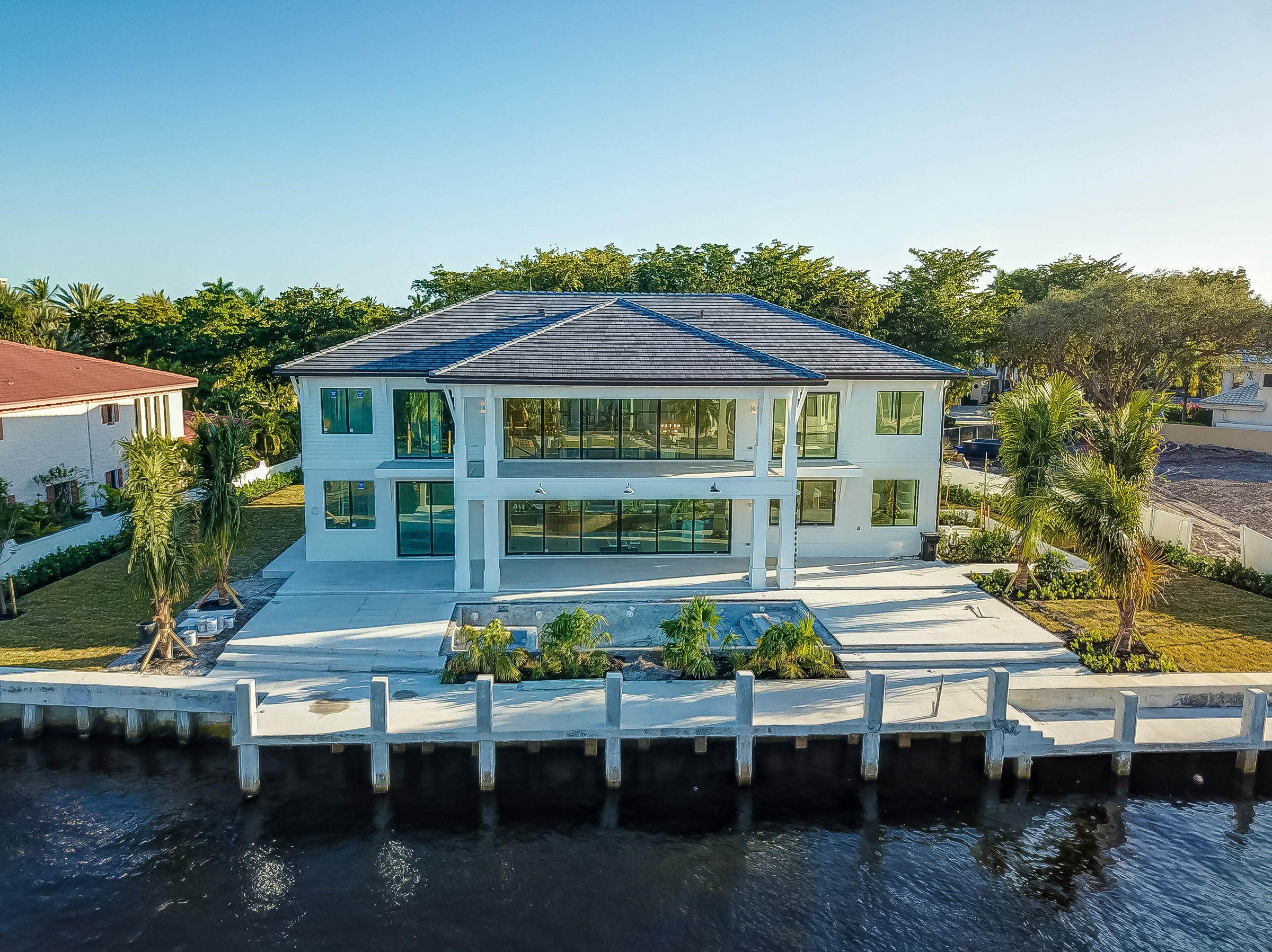 New construction home located within one of the only private, 24 hour guard gated communities in Fort Lauderdale known as Bay Colony. This home sits on an oversized waterfront lot featuring 6 bedrooms and 5.5 bathrooms. Custom chef's kitchen and lavish bathrooms by Mia Cucina. Open floor plan with 22ft ceilings perfect for entertaining and hosting friends and family. Boater's dream with no fixed bridges and easy access to open waterways. One mile away from Pine Crest School. 110' dock, 10' wide, and 151' of Seawall.