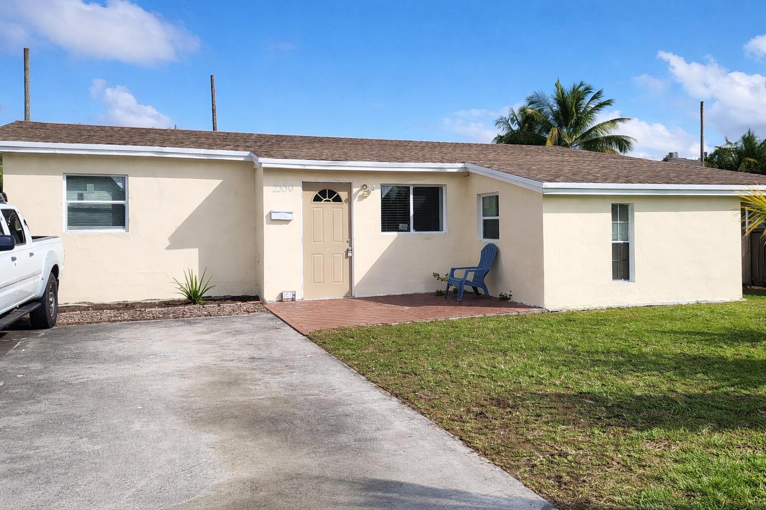 Beautifully updated 5BR/2BA home in a quiet neighborhood with NO HOA! This spacious property blends modern comfort with classic coziness and features a New Roof (2021), New AC (2021), Newer Water Heater,  Hurricane Impact windows throughout and no plumbing issues. Enjoy a large backyard ideal for entertaining, gatherings, adding a pool, or storing a boat or trailer. Perfectly located just 3 minutes from I-95 and close to Dixie Hwy, Federal Hwy, malls, restaurants, and nightlife, offering easy access to everything you need.