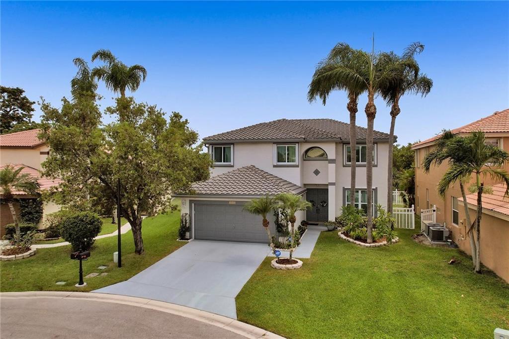 This large single family home is situated on a cul-de-sac with a lovely private lake view with no homes across the lake! The home offers a great layout with lots of living space with a ton of windows & large kitchen overlooking family room, large bedrooms, laundry room & 2 car garage. Pie shaped lot offers a spacious fenced backyard with a mango, avocado, sugar apple & soursop tree.  Upgrades include: impact windows (2020), new roof (2016), A/C (2018), repainted (2016), new gutters with leaf guard (2021), large paver rear patio (2020) and the home has been well maintained.  Nautica Sound is a gated community with clubhouse, swimming pool, fitness center, playground, tennis courts, basket ball court, and school bus pavillion. Maintenance includes common area maintenance & basic cable.