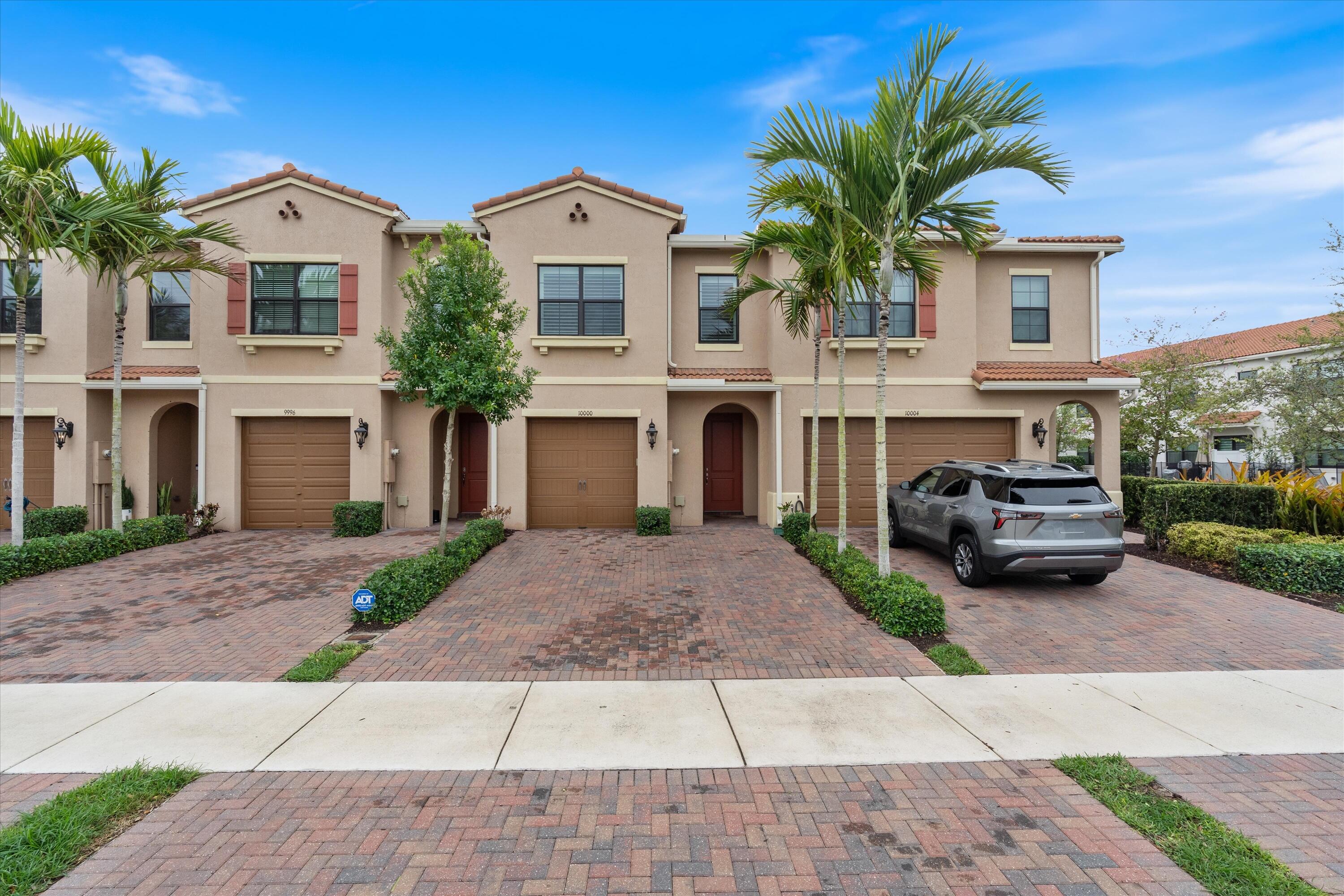3-bedroom, 2.5-bath townhouse built in 2020 located in The Enclave at Boca Dunes featuring lake views and thoughtful upgrades throughout. All three bedrooms are located upstairs, along with a convenient upstairs laundry room, and all three closets have been professionally finished. The spacious kitchen includes a double oven, perfect for entertaining and everyday living, while the upgraded downstairs bathroom and added downstairs storage provide both style and functionality. Additional highlights include plantation shutters throughout, impact windows, impact sliding glass door, and an epoxy-coated garage floor. This home is one of only a handful in the neighborhood with no front-facing neighbors, located directly across from a golf course with no membership required.