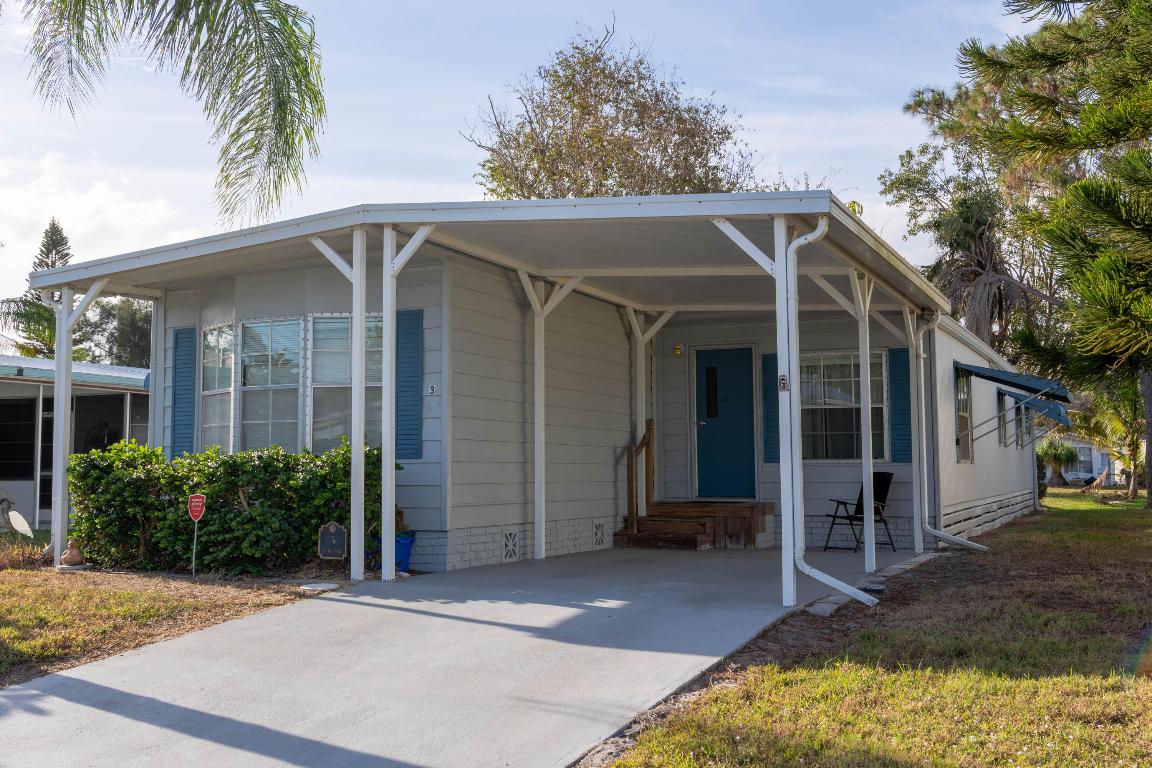 LAKE VIEWS, 55+, 2 bed/2 bath w/ LARGE Florida room! ROOF SEALED & Exterior PAINTED in 2024, AC 2019, Water Htr 2014. Enjoy fishing or watching birds & ducks glide by on the lovely lake. Beauty continues inside w/ sturdy floors. Kitchen boasts gently used appliances & adequate storage. Florida Room w/ AC serves as an additional living room, cafe, office & more! GREAT location in PSL & the community itself in a highly sought area! Tranquil & close to all amenities! Don't miss this opportunity to own a slice of paradise! Lot rent of 943.57 includes private golf course (no fees to play) heated pool, fitness, pickleball, tennis, shuffleboard, bocce, gym, library, card games, MahJong, Bible study, wood workshop, parades, dinners, dances, trips & more! Lawn cutting & trash included.