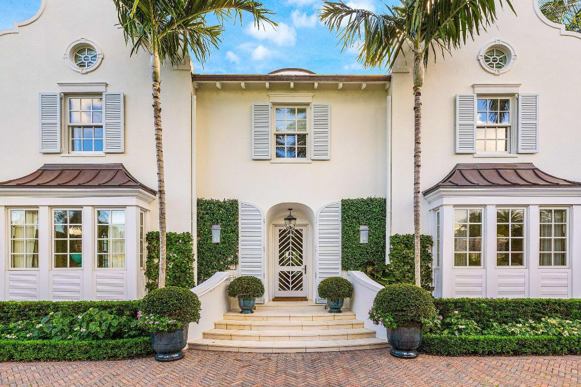 Beautifully renovated Cape Dutch Colonial-style home designed by the late Raphael Saladrigas on a prime North End street, featuring a main house plus guest house, new roof, new A/C with linear air registry, new lighting, and refined interior updates throughout. Highlights include the iconic Chippendale staircase railing, primary his and hers bathrooms, Pecky Cypress ceilings in outside loggia, elevator, bright living spaces, and lush landscaping designed by Nievera Williams. Located steps from the Lake Trail and just moments to beach access off Wells Road. Placed in the top homes on the Garden House Tour, this property offers timeless Palm Beach charm with modern comfort. The beautiful interior captures the pure essence of Palm Beach with no attention to detail lacking.