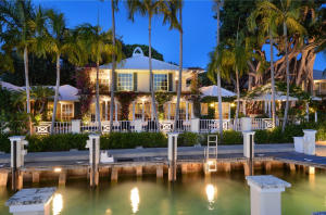 Florida Keys style Main House & Guest House located directly on the intracoastal (170’) with 2 docks, 3 lifts, and 1 deep water boat slip. Close to Palm Beach Inlet; No fixed bridges. Long views south & west. Spectacular, lush, mature vegetation, including large canopy trees and 2 Koi ponds. Pool. Generator. Truly, one of a kind.