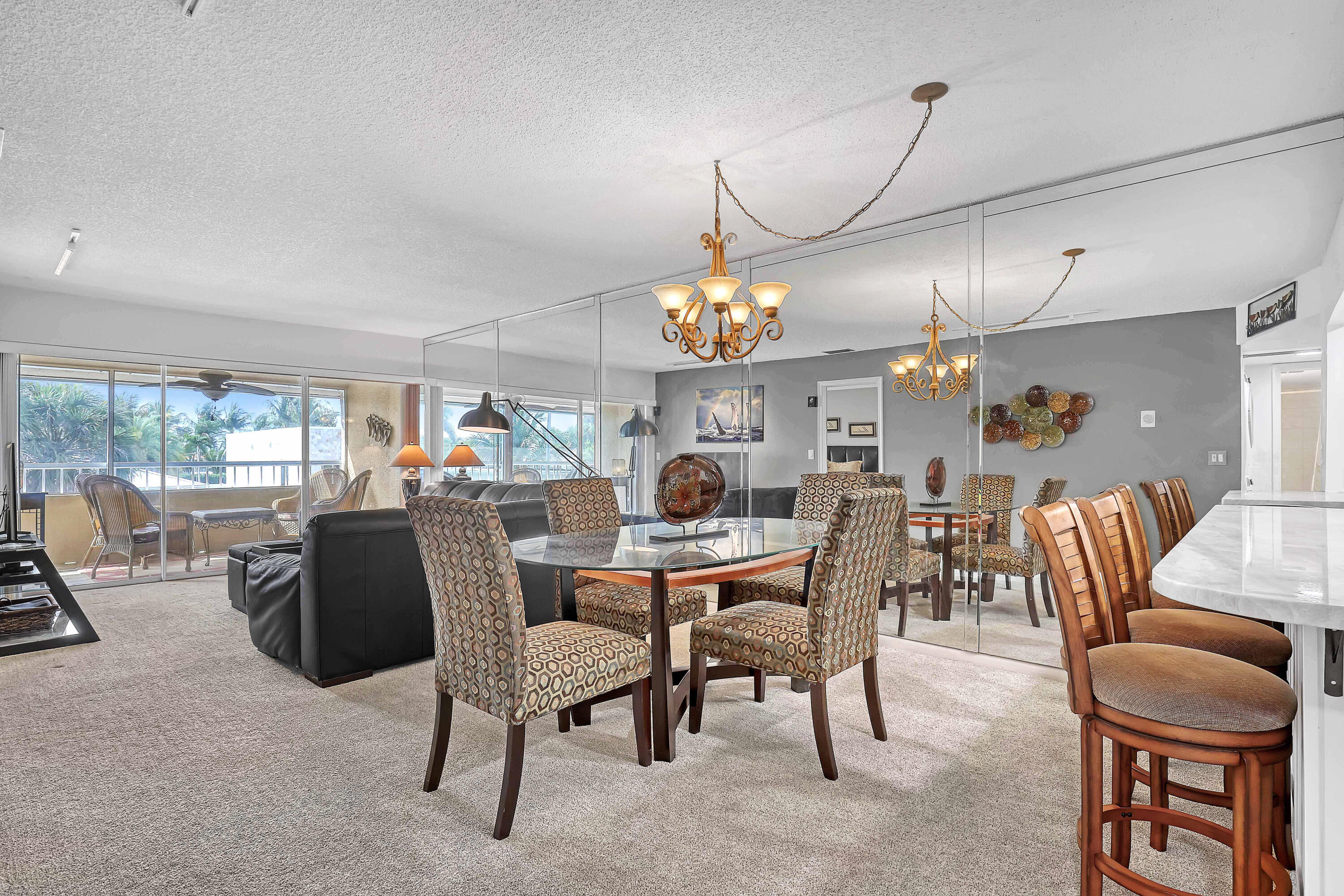 Quiet beach retreat just a short stroll to the sparkling blue waters of the Atlantic on beautiful Singer Island -- truly Singer Island's best-kept secret! This charming island hideaway features two spacious bedrooms with abundant storage, a well-appointed kitchen, and the convenience of a private in-unit washer and dryer. Light-filled living spaces create a relaxed coastal atmosphere, perfect for full-time living or a seasonal escape. Furniture is negotiable, offering an easy move-in opportunity. With only 23 residences, this boutique community provides a private, tranquil, tropical setting. Residents enjoy a community pool, fitness room, sauna, BBQ area, and social room -- everything you need to embrace the island lifestyle. Additional yearly insurance assessment of $1950 which can be paid in 3 installments of $650 .