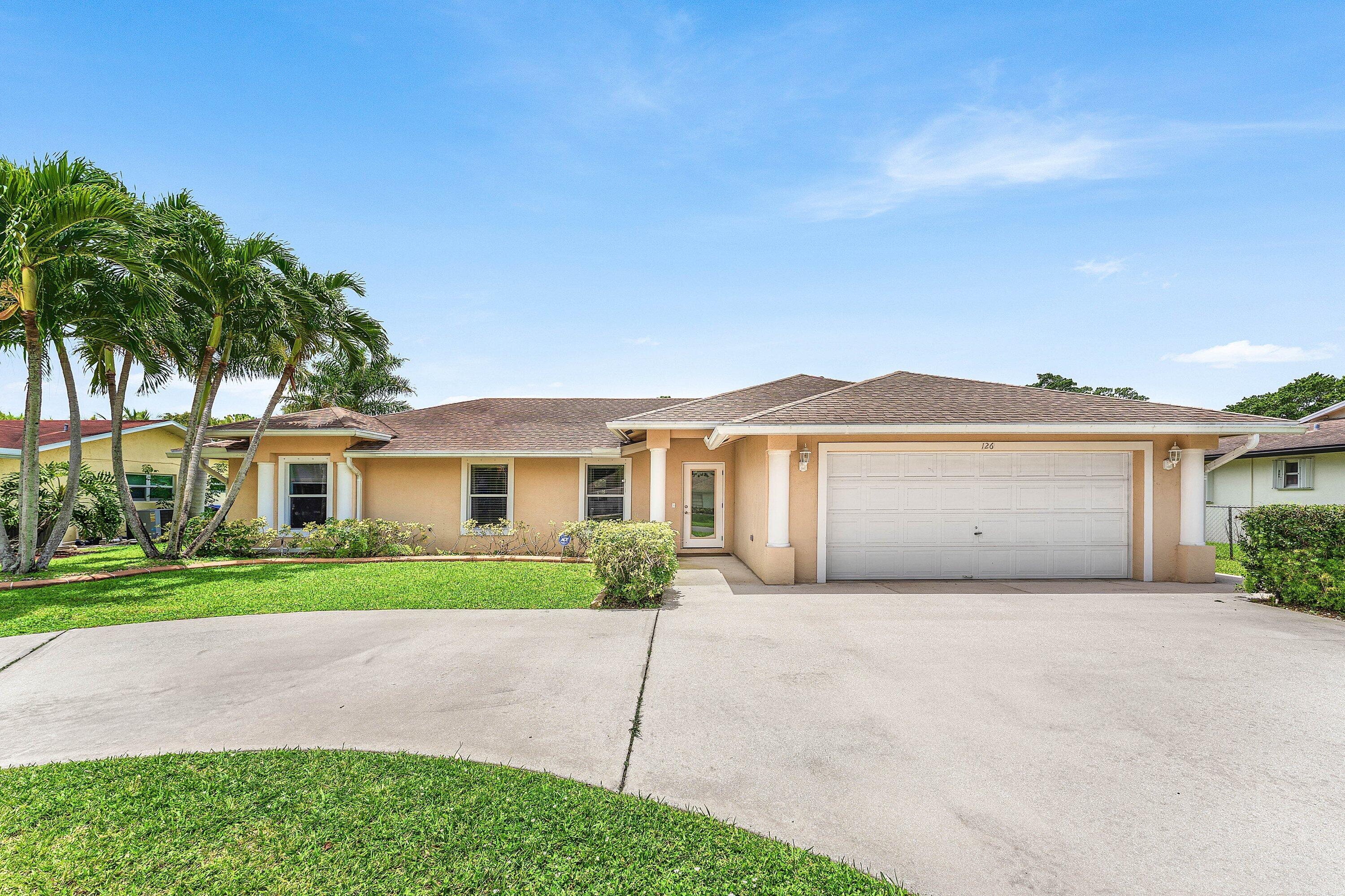 Welcome to this charming single-story residence in the Willows community of Royal Palm Beach. This waterfront property offers three bedrooms and two bathrooms within 1,557 square feet of thoughtfully designed living space. The two-car garage provides convenient parking and storage. Situated on the water in an established community, this residence presents an excellent opportunity for those seeking waterfront living in Royal Palm Beach. Location Location!! Home is minutes away from Publix, Costco, Home depot and main shopping centers.  House has been  remodeled and is turnkey ready. This home will not last so please schedule your showings accordingly.