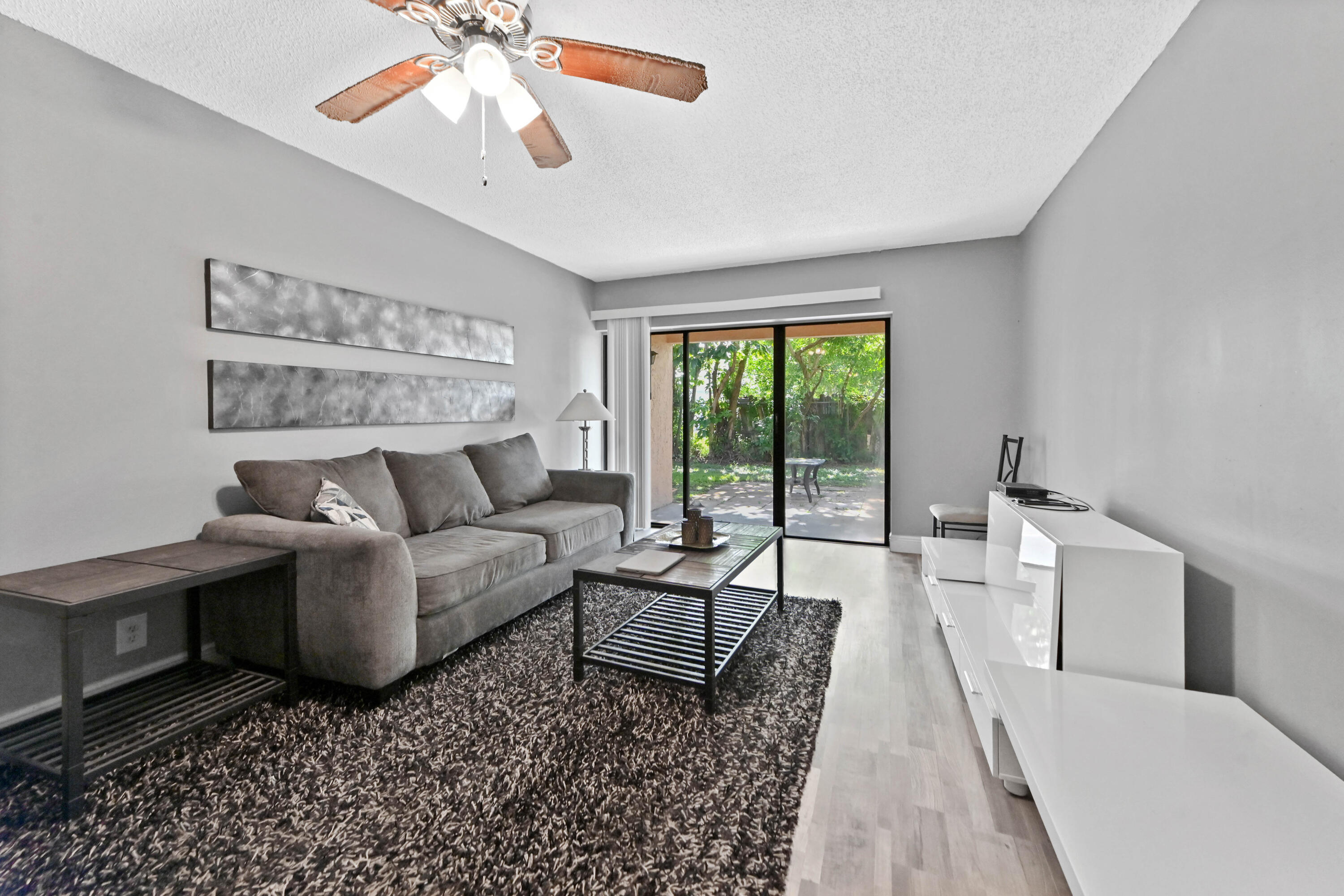 Discover this charming 2-bedroom, 2-bathroom ground floor condominium in Forest Hill Villas Garden, West Palm Beach. Thoughtfully designed across two stories, this residence offers 1,026 square feet of finished living space that efficiently maximizes comfort and convenience. The well-proportioned layout provides distinct areas for living and sleeping, making it an appealing option for those seeking a manageable, low-maintenance home. Located in West Palm Beach, this property presents a wonderful opportunity to own in an established community. This condominium offers an attractive combination of space and practicality for today's homebuyer.