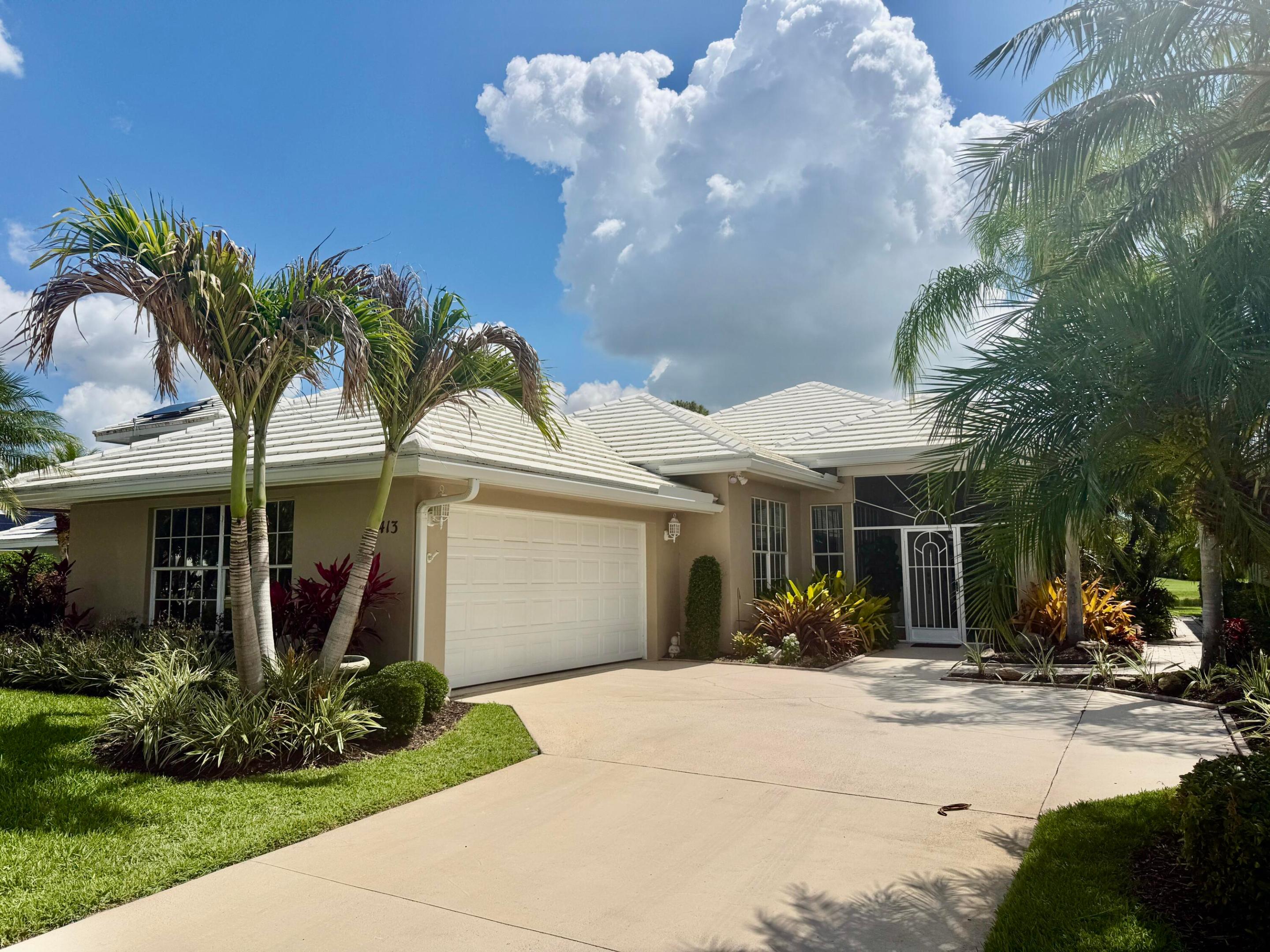Luxury waterfront living in the heart of St. Lucie West! This beautifully updated 3-bedroom pool home offers breathtaking golf and water views. The open-concept design featuring elegant bamboo flooring, granite countertops, dream kitchen with newer stainless steel appliances,  a luxurious master suite with a spa-inspired bathroom. Enjoy entertaining in the formal dining room and spacious living room. Relax by the oversized backyard oasis featuring a large pool and covered patio while enjoying panoramic scenery that never gets old. Florida living at its finest!