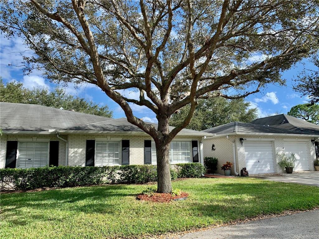 Rarely Available Remodeled Garage Villa in Limetree’s active 55+ pet friendly community! This beautifully updated Villa has spacious rooms, lush garden views & a great location on a quiet, shady tree lined street. Villa 314 redone in 2018 with NEW: Kitchen + Whirlpool SS Appliances, both Baths, Floors, Lighting, Impact Slider, Plantation Shutters, Screen Door & more! Every hour is a Happy Hour on the 206 sqft private Courtyard perfect for indoor/outdoor entertaining. Oversized/331sqft, 1 Car Garage. Newer A/C & W/H. Just steps to Limetree's Multi-Acre Recreation Area + Green-Space! Enjoy the amenities: 6 Tennis & 3 Pickle Ball Courts, 3 Heated Community Pools, Activity Building & a Clubhouse w/ Library, Billiards & Fitness Rooms. Limetree is conveniently located to retail & transportation.