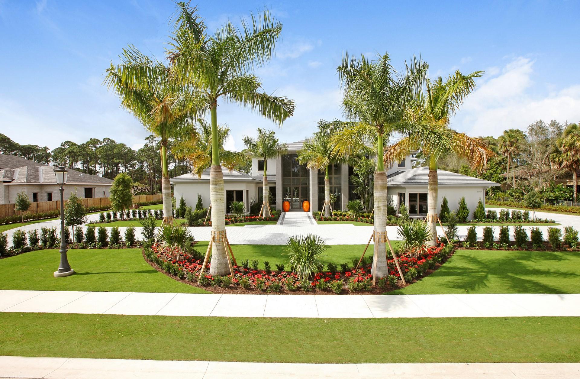 Brand new builder model on desirable one acre golf course lot.  This custom estate home features an expansive Club Room / Library, large motor court, Marble floors throughout, Wine Room, His and Hers master baths, top of the line appliances, outdoor fire pit, tumbled marble pool deck, lush tropical landscaping, oversized custom pool and spa, beautiful outdoor summer kitchen, large balcony with stunning golf view.  Must see this exquisite custom estate.