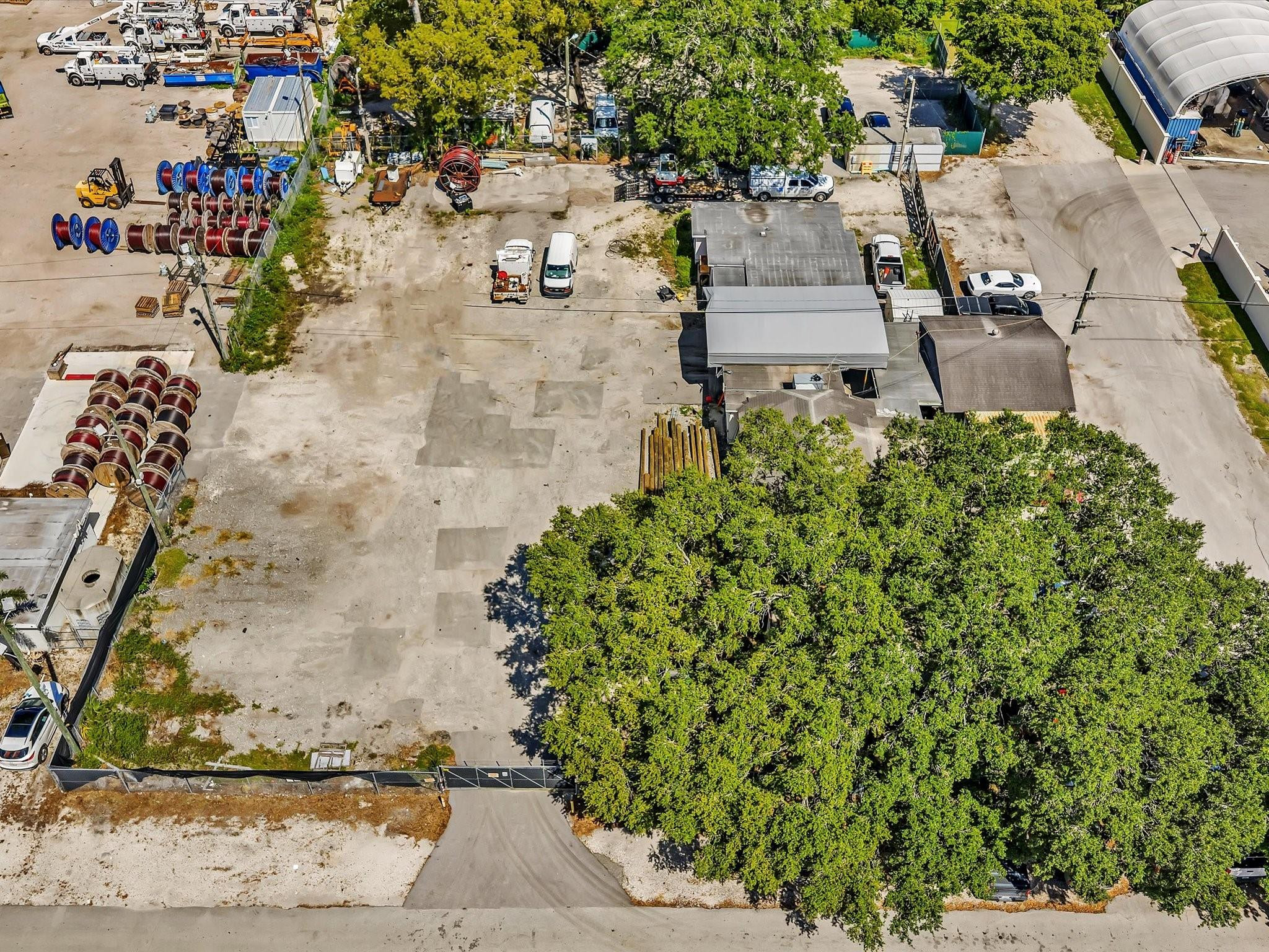 This property is currently zoned as A-1 but we have spoken with the city and they have advised that M-2 should not be a challenge as the property has a business that has been operating out of there since 2009 and the surrounding area is all industrial.  This property is perfect for commercial business who need office space and plenty of room to park their work vehicles.  The property has two buildings on it. The first building has 4 offices, one full bathroom and a kitchen.  The second building is a 3 bedroom, 2 bathroom with a kitchen. This is perfect for employees to get ready, shower and change after a long work day.Please do not distrub the tenants.
