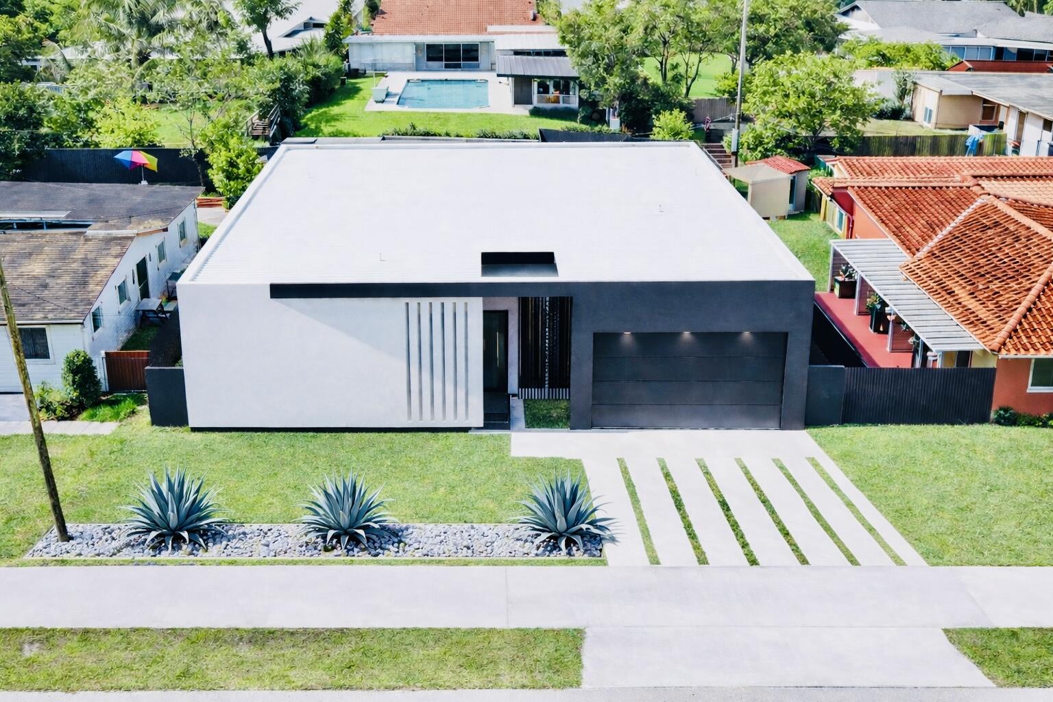 Brand New Contemporary Jewel in Olympia Heights of Miami. 4BD/3.5BA with soaring ceilings, concrete roof, and flawless open layout. Designer European finishes, chef's kitchen with built-in appliances, and a luxe primary suite with wet bar. Resort-style pool with 350 SF covered outdoor terrace with kitchenette/bar—built for entertaining. Spacious 2-car garage. Prime location near Turnpike & Palmetto, top schools, shopping & dining. Estimated completion in ~2 months. Modern luxury done right—rare opportunity. Act fast.  Disclaimer: Select images are artist renderings intended to illustrate the completed design; final finishes may vary slightly.