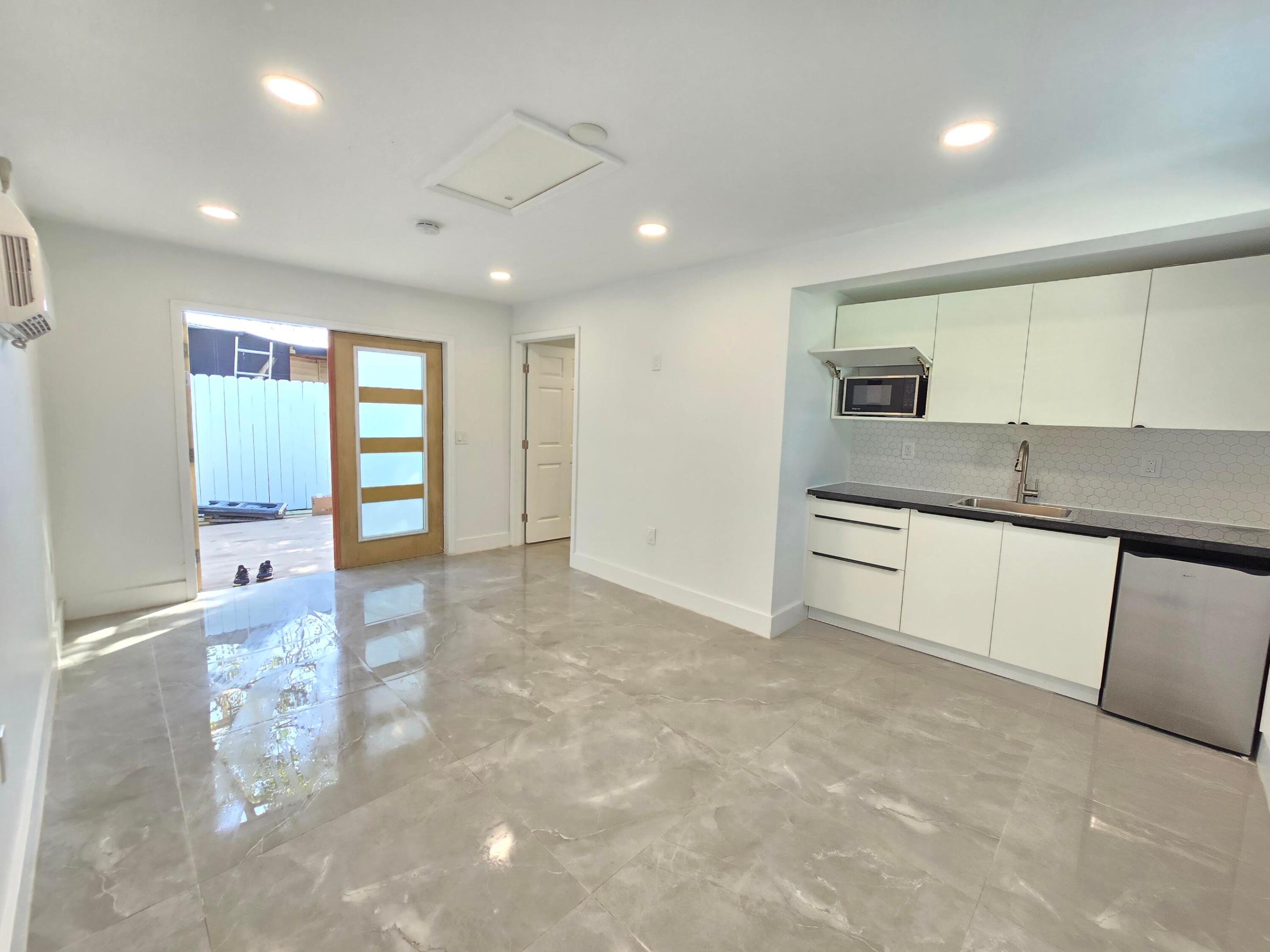Beautiful 1/1, completely renovated, in an amazing private yard. French doors. Must see it! First, last, and security, full tenant screening, proof of income.