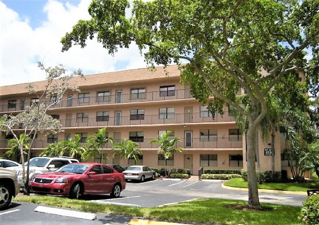 MOVE IN CONDITION ! Beautifully and upgraded unit in phase 4, with large utility room with full size washer and dryer, granite kitchen, elongated wood cabinets, stainless steel appliances, kitchen is totally open to living room, tiled throughout, central ac. is 3 yrs. new, large master bedroom with huge walk-in-closet remodeled cabinetry and shower, 2nd. bath has also been remodeled, sit in screened patio, and enjoy the beautiful & peaceful views of lake and golf course, Sunrise Lakes 4 offers many activities, located in a gated section, 20% down required.