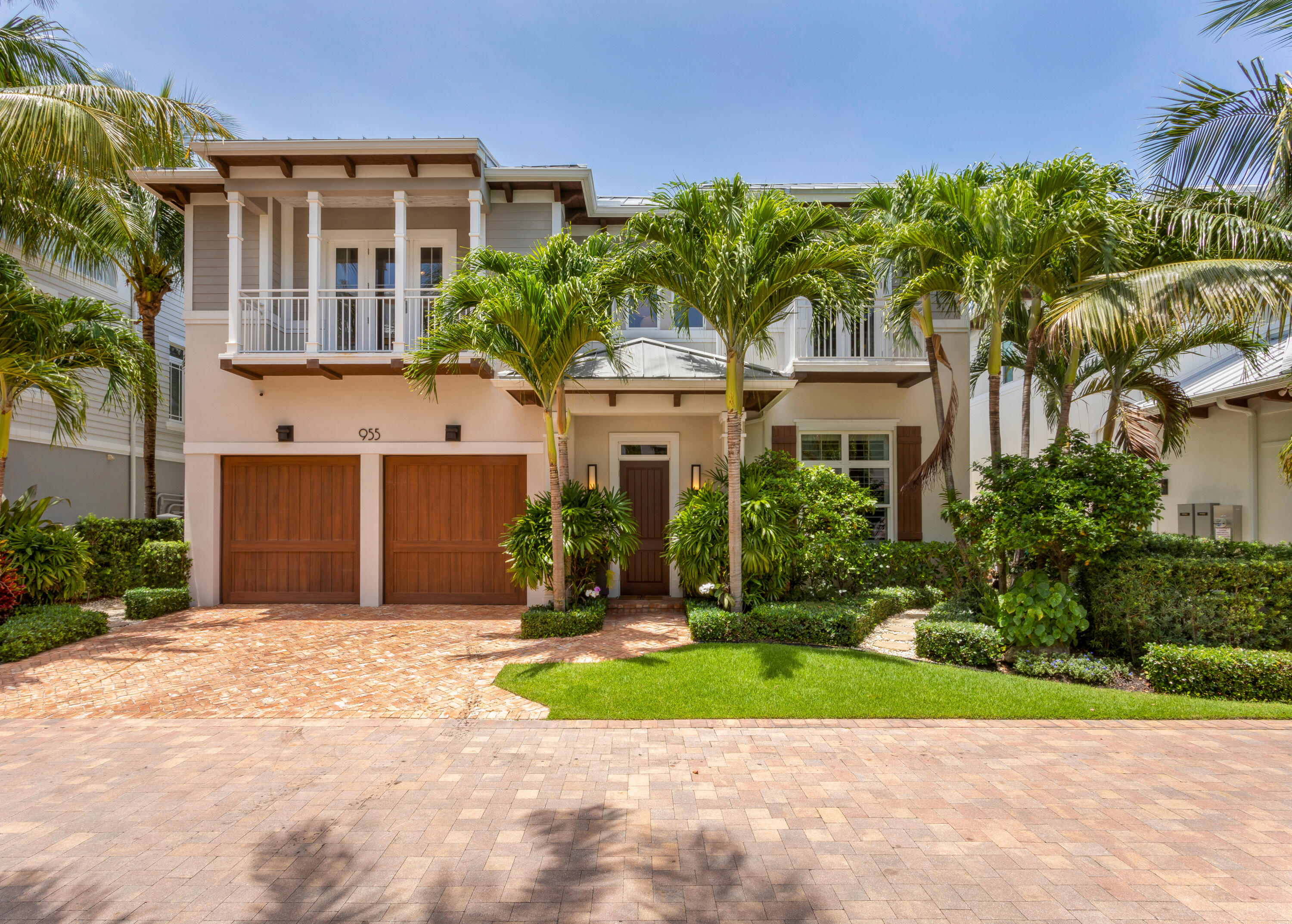 955 Lago Mar Lane, Boca Raton, Florida. Surrounded by South Florida's natural beauty in tony Boca Raton, the exclusive, gated enclave, Lago Mar, is east of the Intracoastal Waterway, nestled between Gumbo Limbo Nature Center and Spanish River Park, with private deeded beach access just across the street. Mizner Park's world-class shopping and dining, as well as Boca Raton's private executive airport are just a short distance away. Completely private and set within lush tropical landscaping, the covered loggia offers idyllic outdoor entertaining space, overlooking the picturesque pool with spill-over spa, which is sited perfectly on the property to enjoy the Florida sunshine all year long. Also in the back yard are a custom built-in gas grill and outdoor shower. Offering the very best of South Florida living in an A+ location by the ocean, this four-bedroom, 5,029 +/- square-foot British West Indies gem, built in 2016 by Jeffrey Krich and designed by acclaimed architect Randall Stofft, features a well-conceived open floor plan with details that include lustrous rubbed-oak plank flooring, 12-foot-high beamed ceilings downstairs with 10-foot-high pitched ceilings on the second floor, and stunning custom moldings and paneling. A light-filled airy space with a chic inviting vibe, the great room, comprising the living and dining areas and open to the kitchen, features a beautiful wainscoted statement wall and large windows and sliding doors that lead out to the loggia and pool area, offering seamless indoor-outdoor living. Centered on a huge island, ideal for entertaining, the chef's kitchen is fitted with solid-wood cabinetry, marble countertops, tile backsplash, custom-fitted walk-in pantry with wine storage, and top-of-the-line appliances that include a stainless-steel Thermador 6-burner gas cooktop, steam convection oven and a Wolf coffee bar. A bedroom/office, which is accessed via sliding barn door from the entry hall, features a beamed ceiling, built-in cabinetry, custom-fitted walk-in closet, and a picture window, shaded by plantation shutters, offering a garden view. The full bathroom on the first floor is convenient to both this room, as well as the pool area. On the second floor, the primary bedroom suite opens to a spacious, covered balcony overlooking the pool and spa through a canopy of palm fronds. The suite includes a morning bar, two custom-fitted walk-in closets and a spa-inspired bathroom with a separate makeup area, double vanities, soaking tub, glass-enclosed walk-in shower and water closet. Also upstairs are two guest-bedroom suites with balconies that overlook the front garden, a loft and custom outfitted laundry room. The layout is completed by an elevator and two-car garage. Additional amenities include imported porcelain tile finishes in the bathrooms, a full-house gas generator, central vacuum, Lutron lighting, Sonos sound, and complete hurricane protection, including automatic shutters enclosing the covered loggia.

DISCLAIMER: Information published or otherwise provided by the listing company and its representatives including but not limited to prices, measurements, square footages, lot sizes, calculations, statistics, and videos are deemed reliable but are not guaranteed and are subject to errors, omissions or changes without notice. All such information should be independently verified by any prospective purchaser or seller. Parties should perform their own due diligence to verify such information prior to a sale or listing. Listing company expressly disclaims any warranty or representation regarding such information. Prices published are either list price, sold price, and/or last asking price. The listing company participates in the Multiple Listing Service and IDX. The properties published as listed and sold are not necessarily exclusive to listing company and may be listed or have sold with other members of the Multiple Listing Service. Transactions where listing company represented both buyers and sellers are calculated as two sales. Cooperating brokers are advised that in the event of a Buyer default, no financial fee will be paid to a cooperating Broker on the Deposits retained by the Seller. No financial fee will be paid to any cooperating broker until title passes or upon actual commencement of a lease. Some affiliations may not be applicable to certain geographic areas. If your property is currently listed with another broker, please disregard any solicitation for services. Copyright 2024 by the listing company. All Rights Reserved.