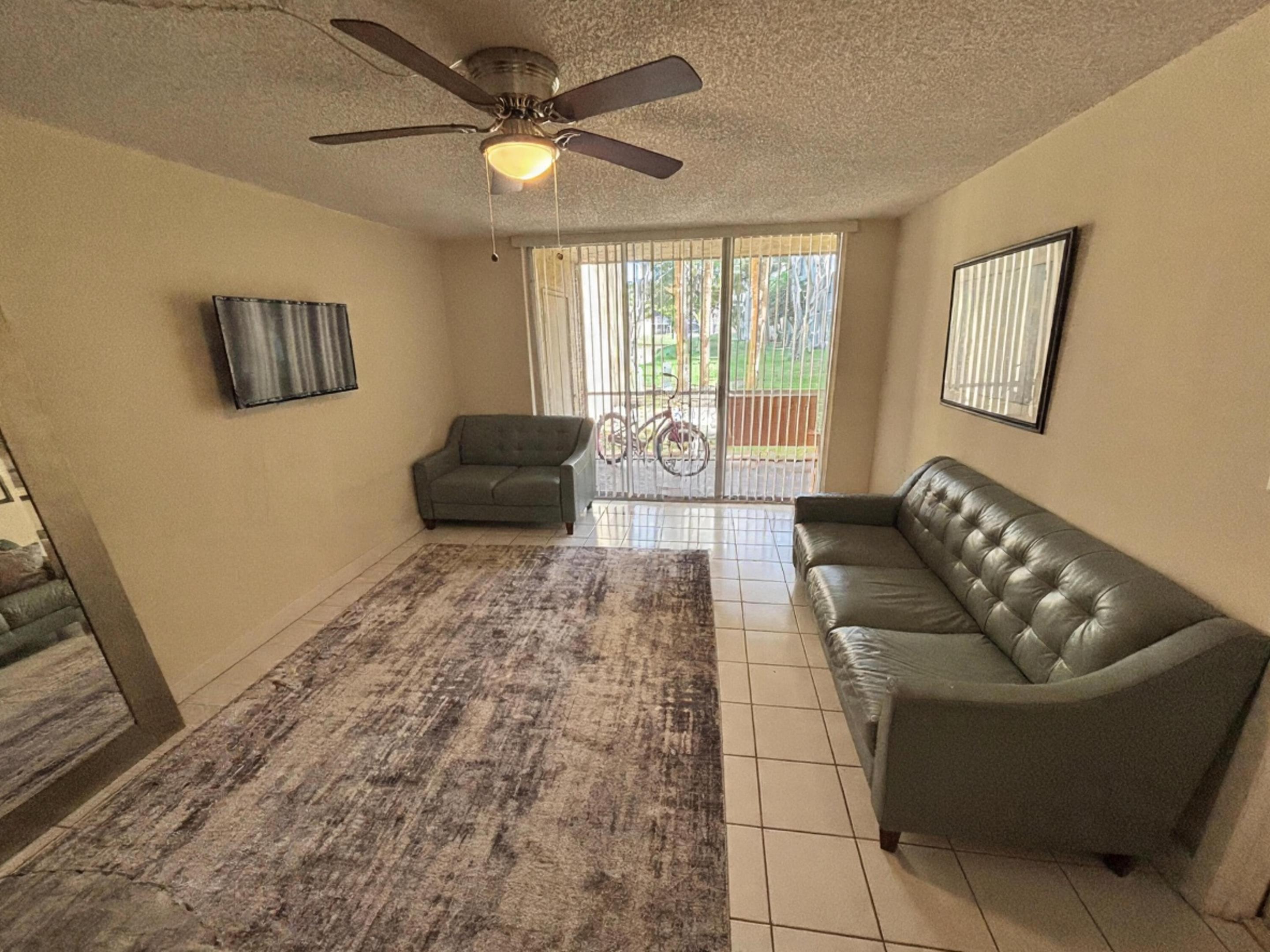 New low price, Motivated Seller! This first-floor condo located in a gated community, is one of the few units with in-unit washer/dryer on the market. Well-kept and furnished, this bright and spacious home features an open living area, walk-in closet, and a serene screened patio with garden views. Resort-style amenities include lake views, clubhouse, tennis and basketball courts, and both standard and Olympic-size pools. Along Oakland Park Blvd. Seller is motivated, ideal for owner-occupants and priced competitively, location, and long-term value.