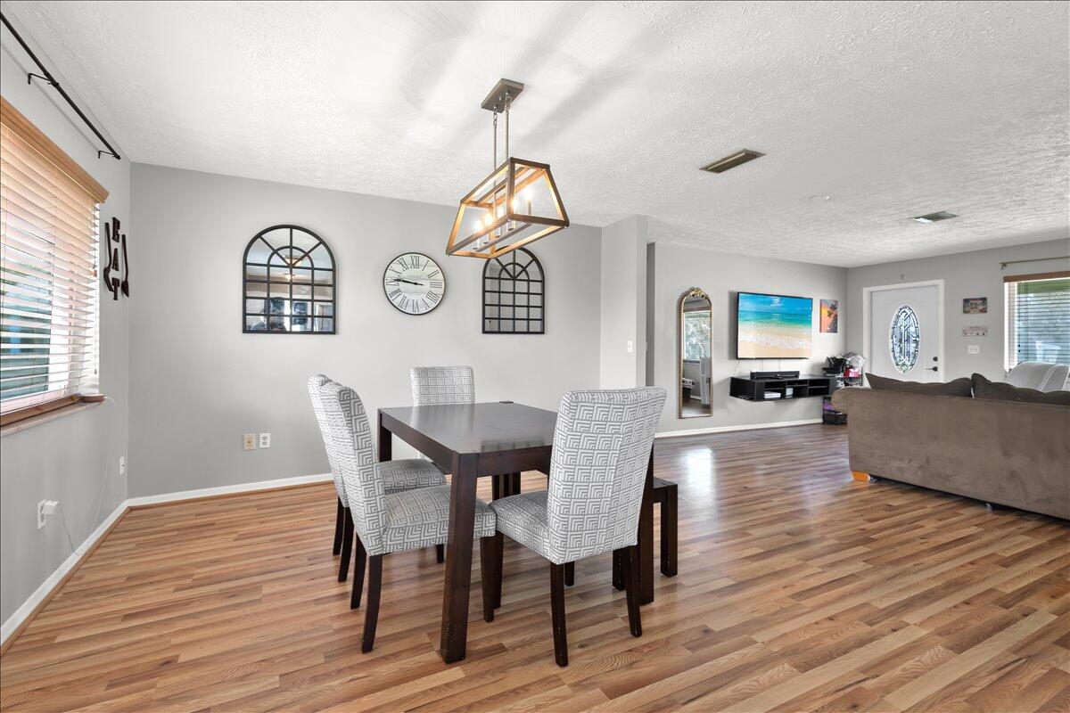 This beautiful CBS home features a 2021 metal roof, spacious backyard for anything your heart can imagine - offering room to relax, entertain, or customize to your needs!  With no HOA - bring all the toys/boats/RV/4 wheelers! Inside, enjoy a bright, functional layout with plenty of natural light and versatile living spaces. Laminate & tile floors let you move right in - no need to replace carpets! A beautiful white barn door allows privacy to the 2ndary bathroom and the primary bathroom has a stunning newly renovated tiled shower. Conveniently situated near shopping, dining, parks, and major roadways, this home combines practical upgrades with a prime location—making it a smart opportunity for homeowners or investors alike.