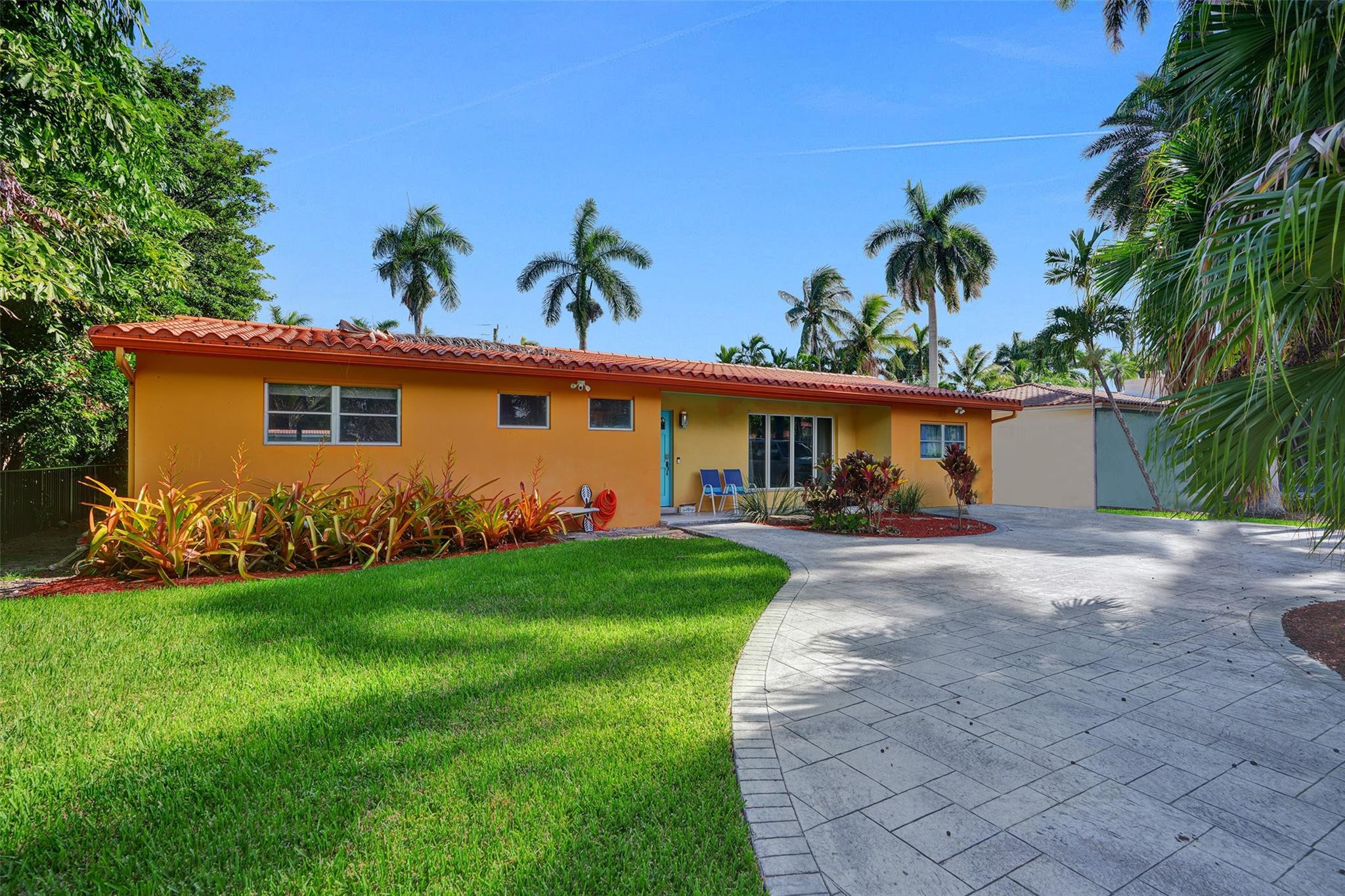Hollywood Lakes Rare Find! Oversized 3 bed / 3 bath home with possible 4th bedroom & in-law suite, one of the largest in this prime area. Unbeatable location just 1 block from South Lake and minutes to the Hollywood Beach Broadwalk. Bike to the ocean, walk to parks, and be close to places of worship, dining, and shopping. Situated on a large lot with room for a pool, this light-filled home features bamboo floors, spacious living areas, and a gourmet kitchen with premium Thermador appliances. Circular driveway with ample parking and lush tropical landscaping add curb appeal. A rare opportunity to own a spacious home in one of South Florida's most desirable coastal neighborhoods, perfect for beachside living, entertaining, and enjoying the Florida lifestyle. Close to house of worship!