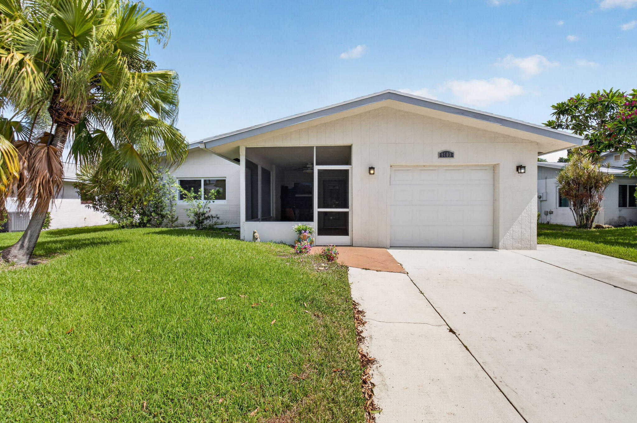 Beautiful 2-bedroom plus den/bonus room, 2-bath single-family home with a 1-car garage in the Delray Villas community. The bright, spacious interior features an open floor plan with tile flooring. The kitchen offers upgraded cabinetry, Corian countertops,  center island, stainless steel appliances, and abundant storage. Both bedrooms are generously sized, and both bathrooms have been recently remodeled with seamless glass doors and upgraded vanities. The primary bath was custom-designed for ADA accessibility. Additional upgrades include hurricane-impact windows and a newer roof installed in 2021. Delray Villas is a 55+ community which offers a very low HOA fee that includes internet, lawn care, cable, two remodeled clubhouses, a heated pool, pickleball, a fitness center, billiards and more Beautiful 2-bedroom plus den/office room, 2-bath single-family home with a 1-car garage in the Delray Villas community. The bright, spacious interior features an open floor plan with tile flooring. The kitchen offers upgraded cabinetry, Corian countertops, a center island, stainless steel appliances, and abundant storage. Both bedrooms are generously sized, and both bathrooms have been recently remodeled with seamless glass doors and upgraded vanities. The primary bath was custom-designed for ADA accessibility. Additional upgrades include hurricane-impact windows and a newer roof installed in 2022. Delray Villas is a 55+ community which offers a very low HOA fee that includes internet, lawn care, cable, two remodeled clubhouses, a heated pool, pickleball, a fitness center, billiards, a card room, and a wide variety of activities. Conveniently located near shopping, dining, Atlantic Avenue, and the beach—this home will not last!
