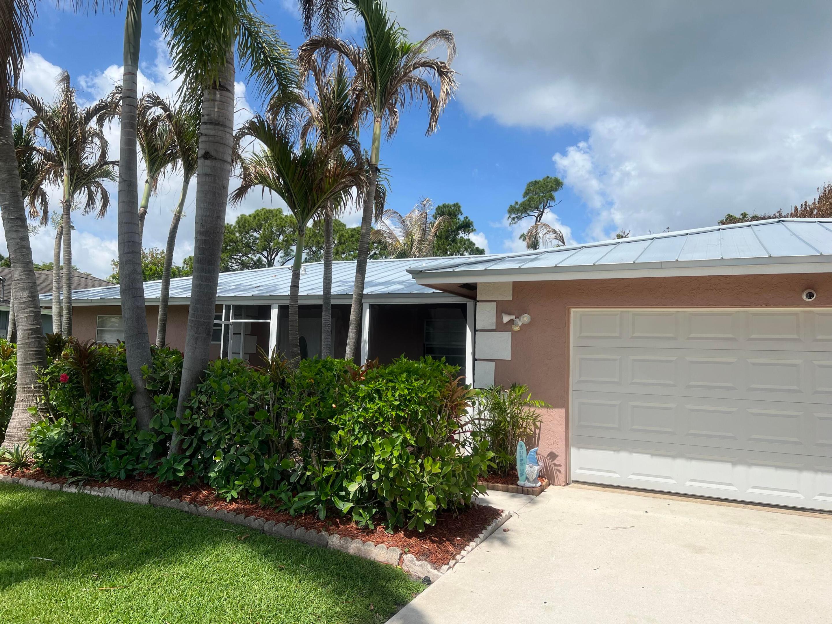 This beautifully maintained 3 bedroom, 2 bath home has tile throughout, granite countertops, Stainless appliances and an enclosed Florida room for extra space. The back yard pergola provides the perfect space for relaxing or entertaining. The back yard also offers a lush garden with mature fruit trees. There are 2 sheds provided in the back yard for extra storage. Lawn Maintenance is included. Please keep in mind, both bathrooms offer showers, no tubs. No pets allowed. DO NOT MISS YOUR OPPORTUNITY TO RENT A LITTLE PIECE OF PARADISE!