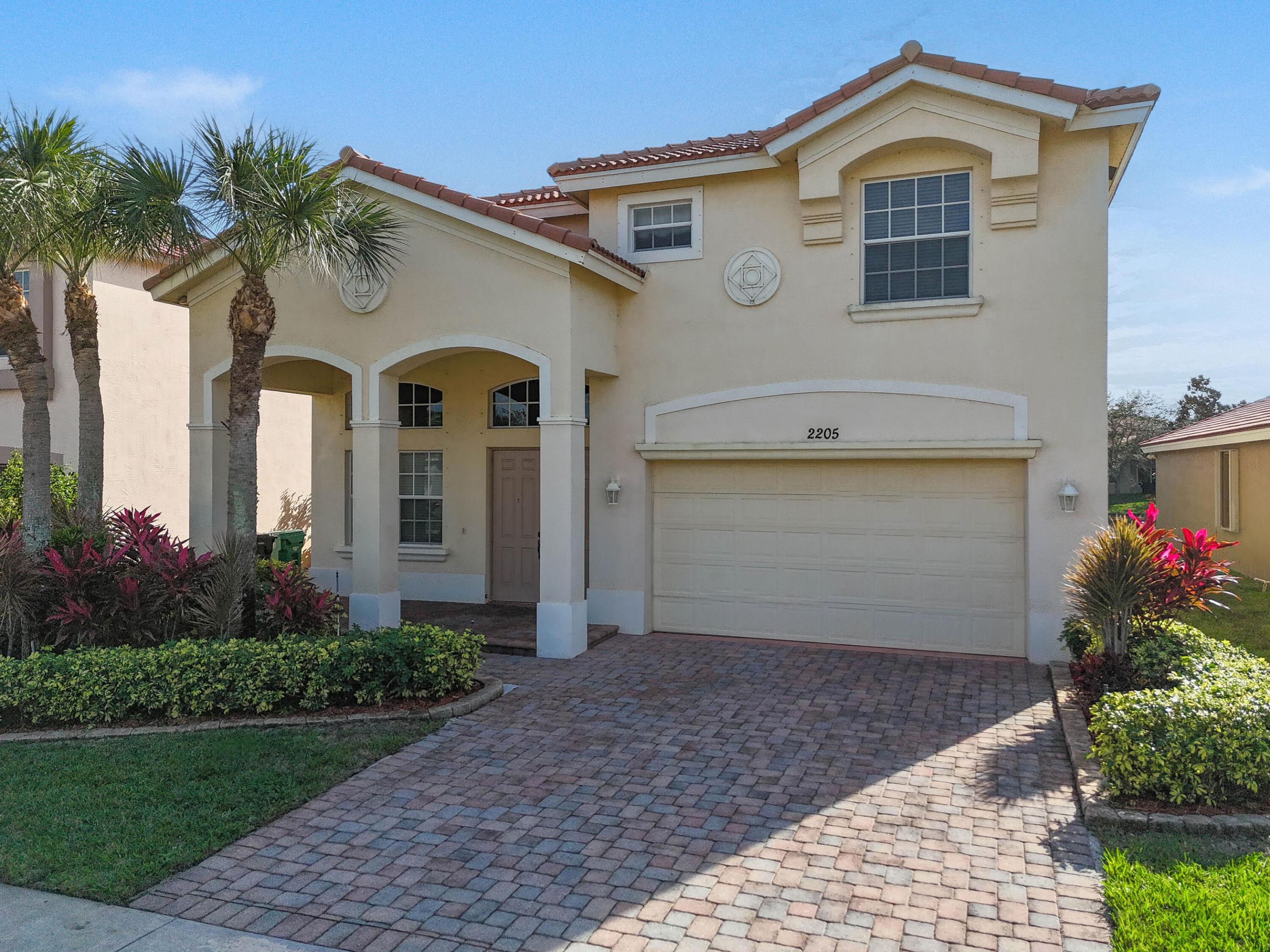 Spectacular 4 BR 2.5 BA 2 CG CBS home in the gated community of Newport Isles in western PSL. Located on a lake front lot with great privacy, and beautiful water views. Double door entry, Tile throughout the living areas. New AC in 2025. New HWH in 2024. Newer stainless appliances. Solid surface counter tops in kitchen. Dual sinks in master bath with separate shower and separate tub. Spacious loft on 2nd floor. Paver brick driveway and walkway, and concrete tile roof. Mature landscape with irrigation system. With over 2700 sq ft under air, this unique home has large secondary rooms, and plenty of living space for the whole family. Newport Isles has 24 hr manned gate, clubhouse with pool, playground, tennis, and so much more. This the great location offers easy access to I95 & Tradition PUD