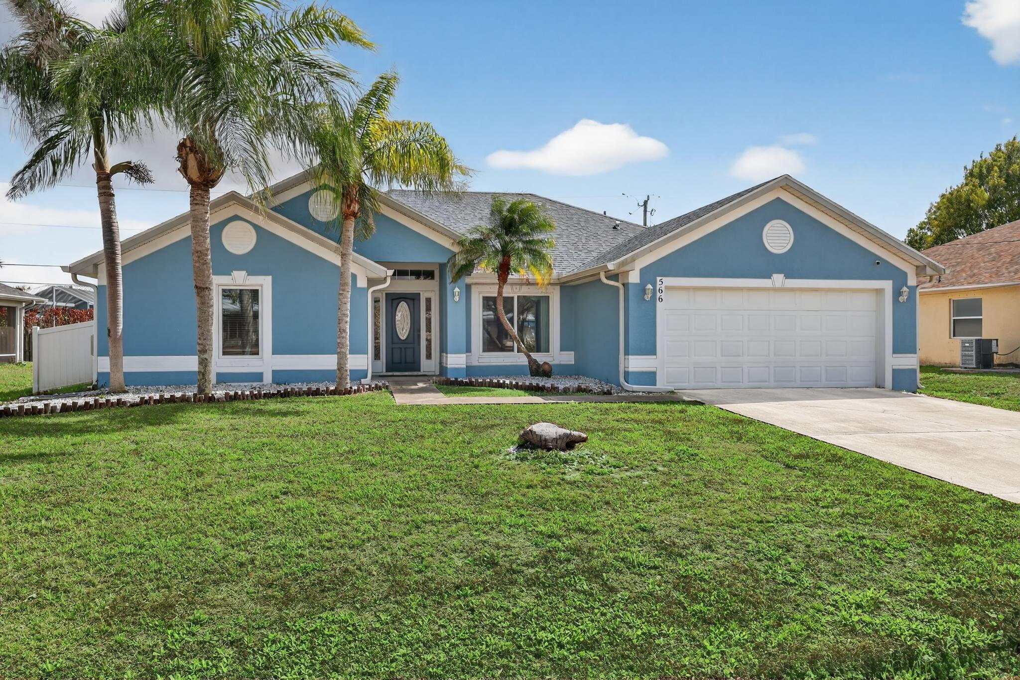 Light, bright, and move-in ready, this beautifully maintained 4-bedroom, 3-bath home with a den is ideally located in Port St. Lucie just minutes from the Crosstown Parkway and within walking distance to nearby schools. The home features soaring vaulted ceilings and a desirable split-bedroom floor plan designed for both comfort and privacy. The spacious primary suite offers a relaxing retreat, while bedrooms two and three share a Jack and Jill bathroom. A versatile den or office provides additional flexible space for a home office, hobby room, or extra living area. The kitchen is equipped with stainless steel appliances installed in 2022. Major updates include a new roof in 2022, impact windows installed in 2023, and a new AC system in 2025. The property also features a spacious lot with  large fenced yard offering plenty of room to enjoy the outdoors.