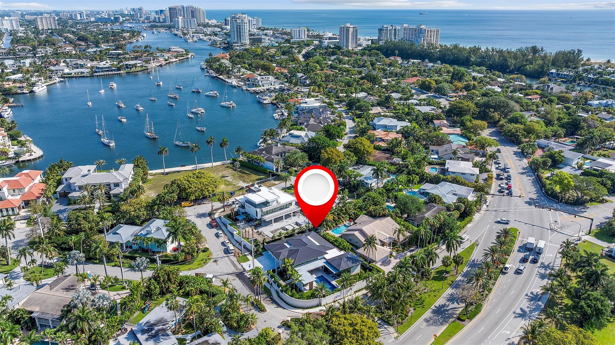 Discover this brand new (2025) single-story modern estate on a +/-15,000 sf lot, redefining Harbor Beach living in Fort Lauderdale’s most exclusive gated island community. Just a short walk to Fort Lauderdale Beach. This design offers unparalleled style, sophistication, and seamless indoor-outdoor living while preserving privacy behind a walled compound and gorgeous landscaping. The cutting-edge 4BR + ofc layout by Tuthill Architecture showcases sleek lines, expansive glass, transom windows and premium materials, creating coastal elegance and modern flair. Each guest bedroom includes an ensuite bath and opens to an outdoor paradise with a covered patio, summer kitchen, and pool. Enjoy the private Harbor Beach Surf Club with 300 feet of beach, boat docks, and more (non-mandatory HOA).