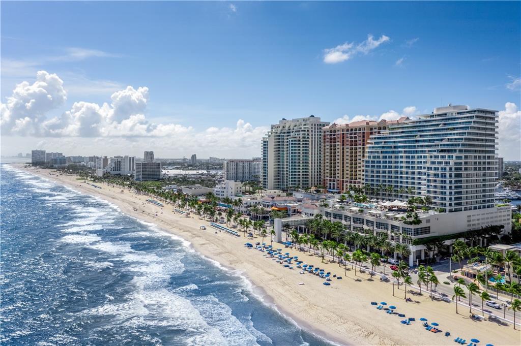 Command a life of luxury & live the sophisticated lifestyle at the Ritz Carlton! Enjoy awe-inspiring, unobstructed ocean views from this prime SE corner residence w/ wrap-around terrace. This lavish unit was just renovated & re-designed at a cost of over $800,000. Expansive ocean & Intracoastal views serve as a backdrop to elegant designer finishes w/ an immaculate modern kitchen at the epicenter featuring a huge center island w/ Sub-Zero, Wolf & Miele appliances. One-of-a-kind exquisite residence boasts a wide open flow-through floor plan w/ walls of glass, an unparalleled master suite w/ sitting room & well-appointed guest rooms all enjoying a luxurious 80 ft terrace to watch the spectacular daily parade of boats on the Intracoastal waterway. Ritz Carlton 5-Diamond award bldg amenities!