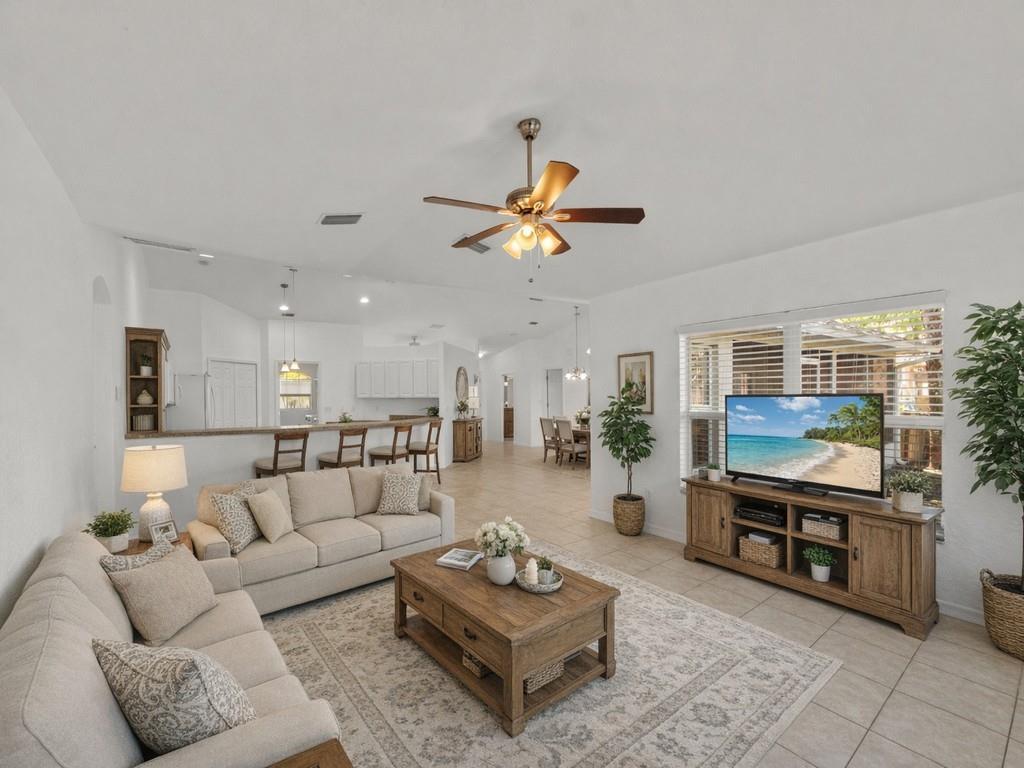 Create an exceptional living experience in this CBS 2012 built home located just a short drive to the active Sebastian River with activities including public boat ramps, jet ski rentals, riverfront restaurants, riverfront parks and scenic views. This spacious home offers a large and split floor plan including 3 large bedrooms + den, spacious kitchen, dining area, vaulted ceilings, new carpet, fresh paint, tile floors and plenty of natural light. Step outside to the 24x8 screened patio overlooking the fenced backyard with lush landscaping giving a country vibe. Vacant cleaned and ready!