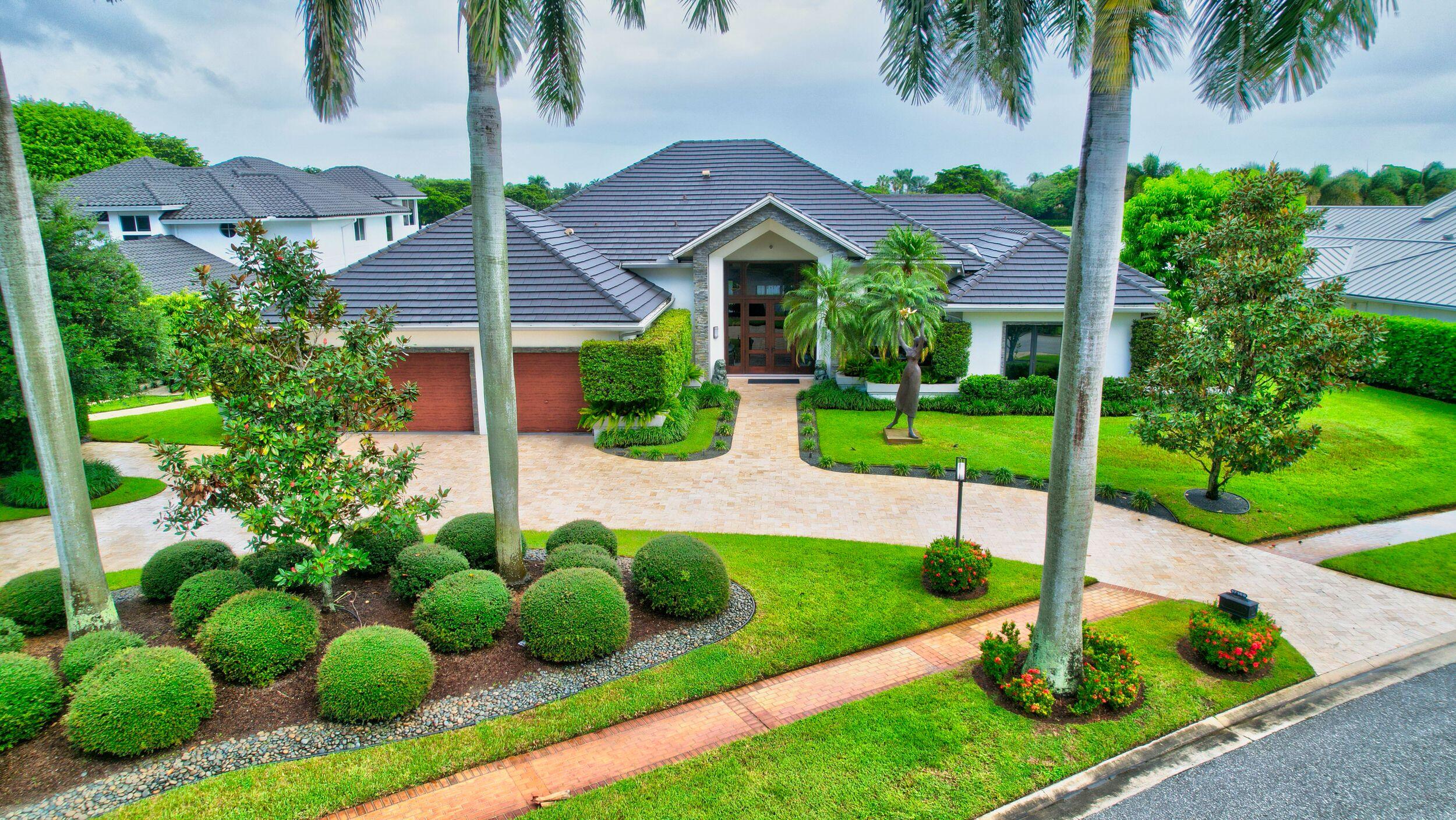 Fully renovated one-story 4-bedroom + office home, located on an oversized, half-acre lot with lake & golf course views in St. Andrews Country Club! The interior is open, light and bright, with volume ceilings, and features a water purification system, all hurricane impact windows and doors, and a full-house generator. The kitchen has a large island and all Bosch appliances, including double ovens and built-in beverage maker. All guest bedrooms are ensuite with custom built out closets. Outside is an oversized pool, spacious open, covered, and screened-in patio areas, and stunning lake & fairway views.
