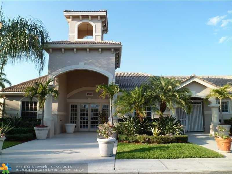 Welcome to this bright and efficient one-bedroom, one-bathroom condominium nestled in the Evergreen Lakes Condo community of Coconut Creek, Florida. Offering 778 square feet of well-designed living space across three stories, this residence provides comfortable proportions perfect for streamlined living. The thoughtful floor plan maximizes functionality while maintaining an open, airy atmosphere. Located in an established community, this condo represents an excellent opportunity for those seeking a manageable property in a convenient Coconut Creek location. VERY SPACIOUS ONE BEDROOM ONE BATH FIRST FLOOR LAKEVIEW APT WITH FRENCH DOORS LEADING TO THE PATIO. FULL SIZE WASHER AND DRYER LOCATED IN THE APT. WATER, SEWER, AND TRASH IS INCLUDED IN THE RENT. TILE AND LAMINATE FLOORING THROUGHOUT. BUILT IN MICRO WAVE, WOOD KITCHEN CABINETS, SMOOTH TOP STOVE, UPGRADED BATHROOM VANITY AND TWO CEILING FANS WITH LIGHT KITS. ASSOC REQUIRES A MIN 620 CREDIT SCORE. ASSOC. APPROVAL IS REQUIRED. PROFESSIONALLY MANAGED. LOCATED CLOSE TO COCONUT CREEK CASINO, RESTAURANTS, AND MAJOR HIGHWAYS. GATED, ALL AMENITIES INCLUDING CLUBHOUSE, FITNESS CENTER, SPA AND MORE. RENTER'S INSURANCE IS REQUIRED. FIRST MONTH RENT AND ONE MONTH SECURITY FUNDS FOR MOVE IN.