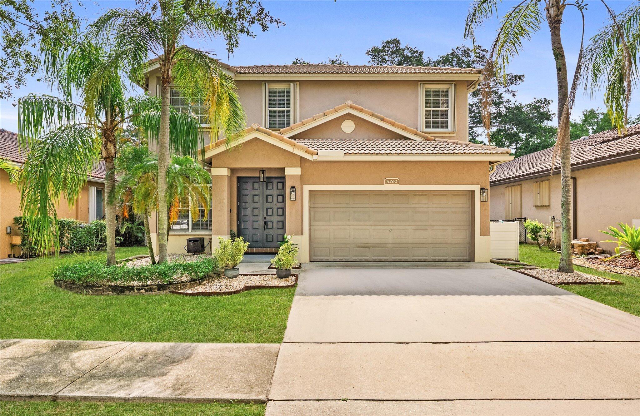Welcome Home to this beautifully updated 4-bedroom, 2.5-bath residence offering over 2,500 square feet of living space in the highly sought-after guard-gated community of Regency Lakes. Perfectly situated on a tranquil preserve lot, this exceptional home combines modern elegance, comfort, and resort-style outdoor living, all within close proximity to top-rated schools, shopping, dining, and everyday conveniences. Step inside to discover a thoughtfully designed open-concept floor plan featuring modern wood flooring throughout the first floor, sophisticated lighting fixtures, and spacious living and dining areas ideal for both everyday living and entertaining.  The renovated gourmet kitchen showcases quartz countertops, stainless steel appliances, ample cabinetry, and seamless flow into the main living spaces. Upstairs, the elegant staircase leads to generously sized bedrooms and a luxurious primary suite featuring a private sitting area and screened balcony overlooking the serene preserve. The spa-inspired primary bath offers a relaxing soaking tub, separate shower, and an oversized custom walk-in closet designed for maximum organization and storage. Recent upgrades provide peace of mind and added value, including a newer air conditioning system, newer hot water heater, and accordion hurricane shutters for enhanced storm protection. The backyard has been transformed into a private outdoor oasis featuring premium artificial turf, a privacy fence, a hot tub, a custom outdoor bar equipped with a kegerator and two mounted TVs, a storage shed, and an expansive patio finished with luxury porcelain tile—perfect for entertaining family and friends year-round while enjoying beautiful preserve views. HOA includes 24-hour security, lawn service, AT&T 1-gig fiber internet, and ADT home alarm system monitoring. Residents of the community enjoy resort-style amenities including a community pool, tennis and pickleball courts, a basketball court, scenic walking trails, a clubhouse, and a fitness center. Ideally located near major highways, A-rated schools, premier dining, and shopping destinations, this home offers the perfect balance of privacy, comfort, and convenience.