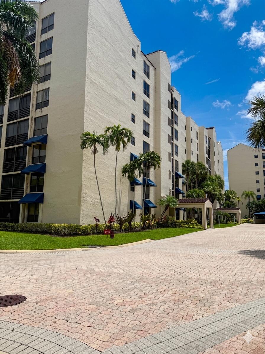 Rare opportunity in sought-after Regency Lake at Boca Pointe, all ages community. Oversize 3 BR/2.5 BA condo 2,150 SF of thoughtfully designed living space offering grandeur & elegance throughout.  Spacious living & dining areas flow effortlessly, ideal for everyday comfort & entertaining. Eat-in kitchen feat SS appliances & granite countertops. Formal dining room sets the stage for elegant dinner parties & special occasions. The luxurious master suite is boasting a large walk-in closet  and a spacious private bathroom. Newer floors enhance the fresh, updated feel throughout. Half Rare opportunity in sought-after Regency Lake at Boca Pointe, all ages community. Stunning 3 BR/2.5 BA  2,150 SF of thoughtfully design. Spacious living & dining areas flow effortlessly, ideal comfort & entertaining. Eat-in kitchen SS appliances & granite countertops  Formal dining room sets the stage for elegant dinner parties & special occasions. The luxurious master suite is boasting a large walk-in closet and a  spacious private bathroom. Newer floors throughout. Half bath adds convenience for residents & guests. In-unit washer & dryer provide the ultimate convenience. Enclosed patio offers versatile space perfect for enjoying FL's beautiful weather year-round. Community amenities incl pool, clubhouse, manned gated 24-hr security & covered reserved parking. Non-mandatory country club w/optional golf & tennis memberships gives flexibility to tailor your lifestyle. Renting during first year permitted. Don't miss this exceptional condo. Schedule a private preview today.