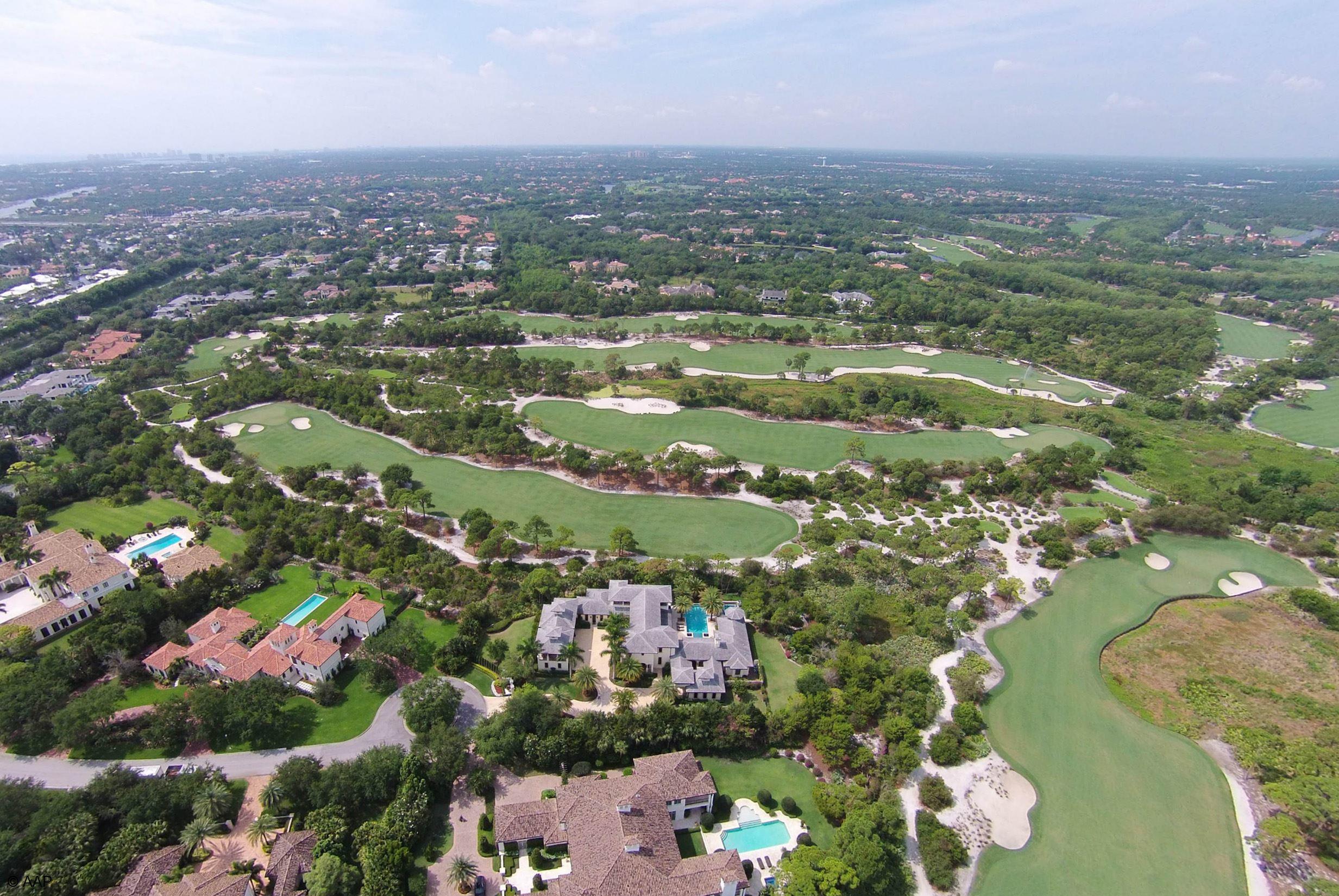 Exceptional West Indies style custom estate with clean transitional interiors located on the 6th fairway of the Jack Nicklaus signature course at The Bears Club.  The property features additional golf views of the 7th and 8th holes.The home was originally built in 2007 and extensively renovated in 2013.  The home offers over 13,650 total square feet with 6 bedrooms, 6 full and 2 half baths, 4.5 car garage, resort style pool, media room and wine room.  The property totals 1.27 acres with additional buildable footprint remaining for an expansion or the addition of other amenities. (See supplement for full property details) Amenities include Loewen doors & windows, Mahogany doors, trim & crown molding, a sound proofed Art Deco themed theatre w/seating & blackout shade, a billiard room overlooking the golf course & an over sized office that offers Versailles Plank flooring, Mahogany built-ins & Mahogany walls w/Burrell Walnut inlays. The gourmet kitchen has custom wood cabinets, Jerusalem Stone flooring, 2 Bosch dishwashers, a Wolf six burner gas stove w/griddle & an adjoining wine room w/ a 684 bottle capacity. The ample master bedroom boasts Venetian plastered walls, large walk-in c... (see supplement for full remarks)

Overlooking the sixth, seventeenth and eighth fairways this British West Indies Colonial designed estate home offers the utmost in privacy & luxury on a one acre plus cul-de-sac lot location.Amenities include Loewen doors & windows, Mahogany doors, trim & crown molding, a sound proofed Art Deco themed theatre w/seating & blackout shade, a billiard room overlooking the golf course & an over sized office that offers Versailles Plank flooring, Mahogany built-ins & Mahogany walls w/Burrell Walnut inlays. The gourmet kitchen has custom wood cabinets, Jerusalem Stone flooring, 2 Bosch dishwashers, a Wolf six burner gas stove w/griddle & an adjoining wine room w/ a 684 bottle capacity. The ample master bedroom boasts Venetian plastered walls, large walk-in closets & overlooks the pool w/beach swim out & raised hot tub. The master bath has Tiger Eye Onyx floors & a steam shower. Other amenities include a distributed audio system, Icynene insulation in all walls & ceilings, 7 zones of A/C, a large covered summer kitchen w/a bar, Wolf grill & fireplace, Turkish marble driveway & storm water drainage system for the entire home.