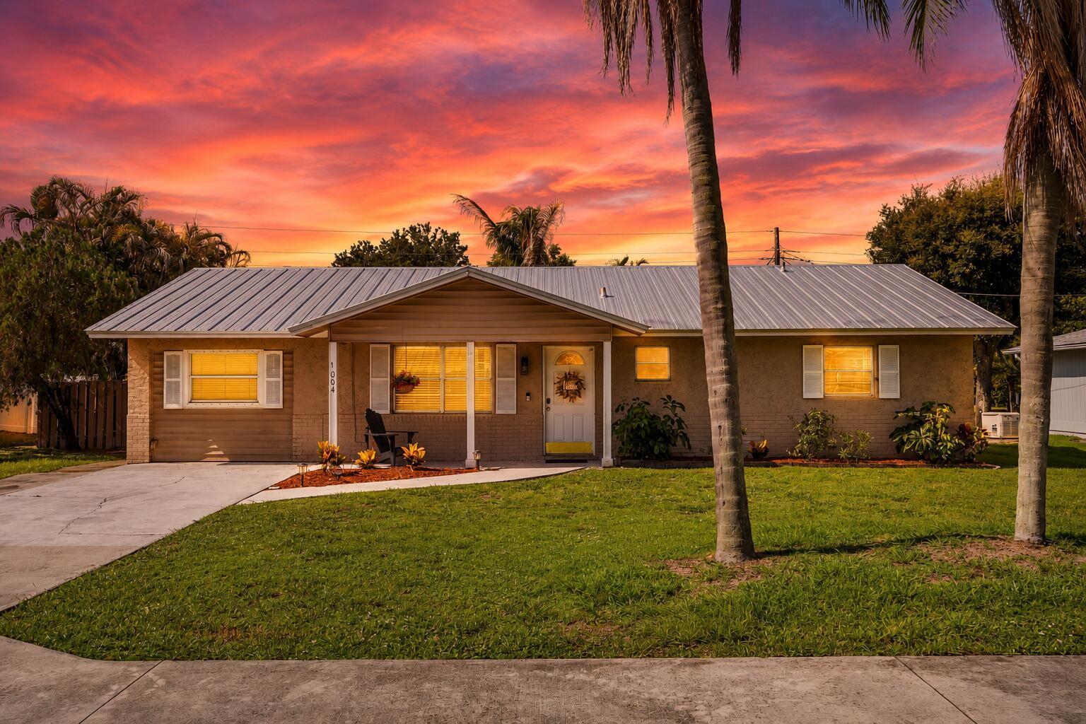 Welcome to 1004 NW 16th Pl in Stuart, FL 34994. Bring your boat or RV! This charming house boasts a unique opportunity for resort living in your own backyard with a fabulous inground pool & new filtration system. There is a covered poolside leisure area with firepit and seating overlooking the pool, The property's exterior features a classic design with a welcoming facade that integrates seamlessly into the neighborhood. The house stands in a serene location, providing a peaceful setting while still being conveniently accessible to the amenities of Stuart. The property showcases a spacious layout, with ample potential for creating a personalized living space. Beautifully maintained landscaping provides an inviting atmosphere, enhancing the overall curb appeal. This hous e presents a wonderful chance to establish a home in a desirable location close to downtown Stuart and it's sought after dining and boutique shops . Explore the possibilities of this property and imagine the lifestyle it can provide. Whether you are considering a move or looking for an established investment property, this home is worth exploring for its location and potential.
