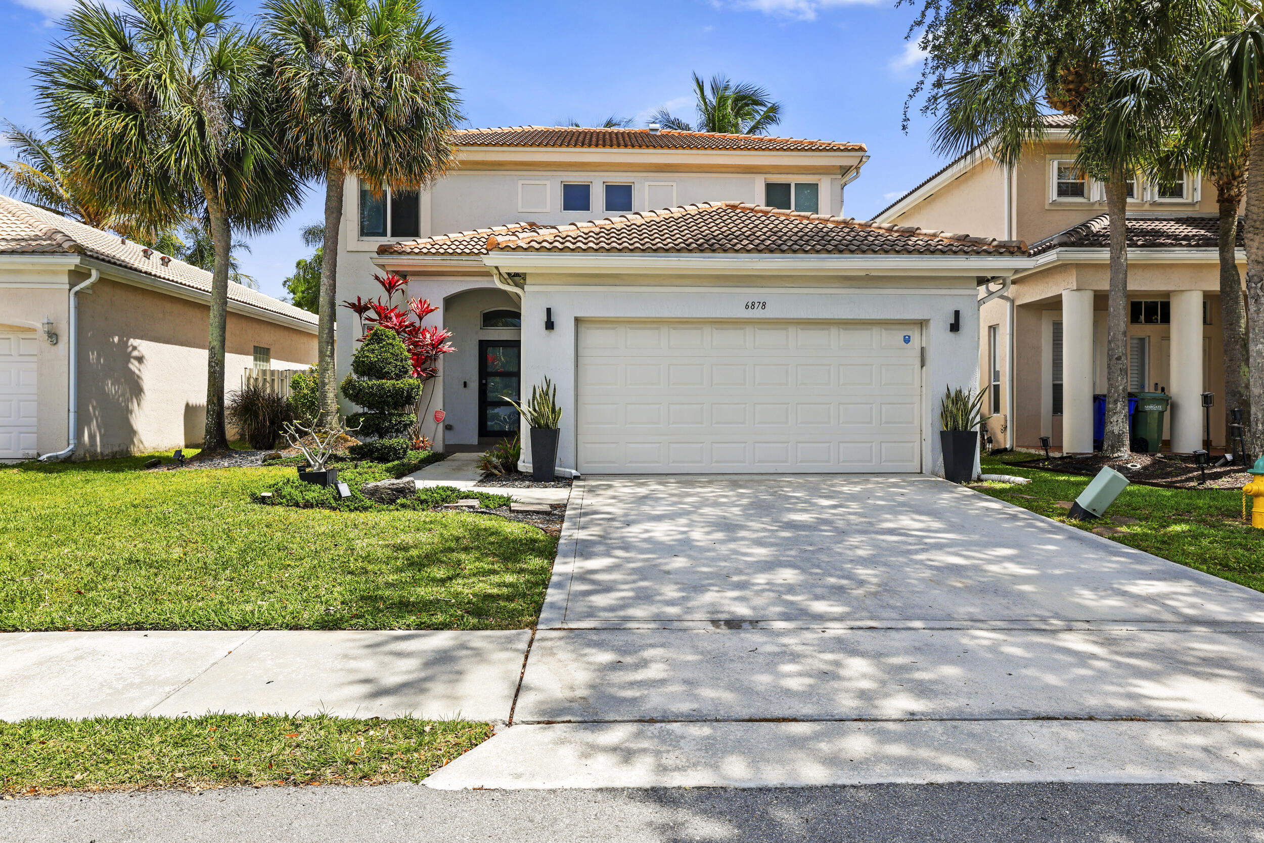 Welcome Home!! This beautiful 3 Bedroom 2 1/2 Bath Two Story House is waiting for You! Interior Features Include Updated Kitchen with Granite Countertops and Stainless Steel Appliances, Eat In Kitchen Area, Primary Suite with Walk in Closet and Huge Bathroom, Open Living Room, Updated Second Bathroom with Dual Sinks, Updates Throughout, Smart Home, Nest Thermostat, Tile and Laminate Floors. Exterior Features Include Hurricane Impact Windows, Impact Sliding Door, Front Door, 2 Car Garage, Modern Front Landscape and Large Fully Fenced Backyard with Mango Tree and Coconuts, Sun setter Power Retractable for Extra Shade, Paver Patio. Roof 2022. Incredibly low HOA cost!! Amazing Community and LOCATION!!