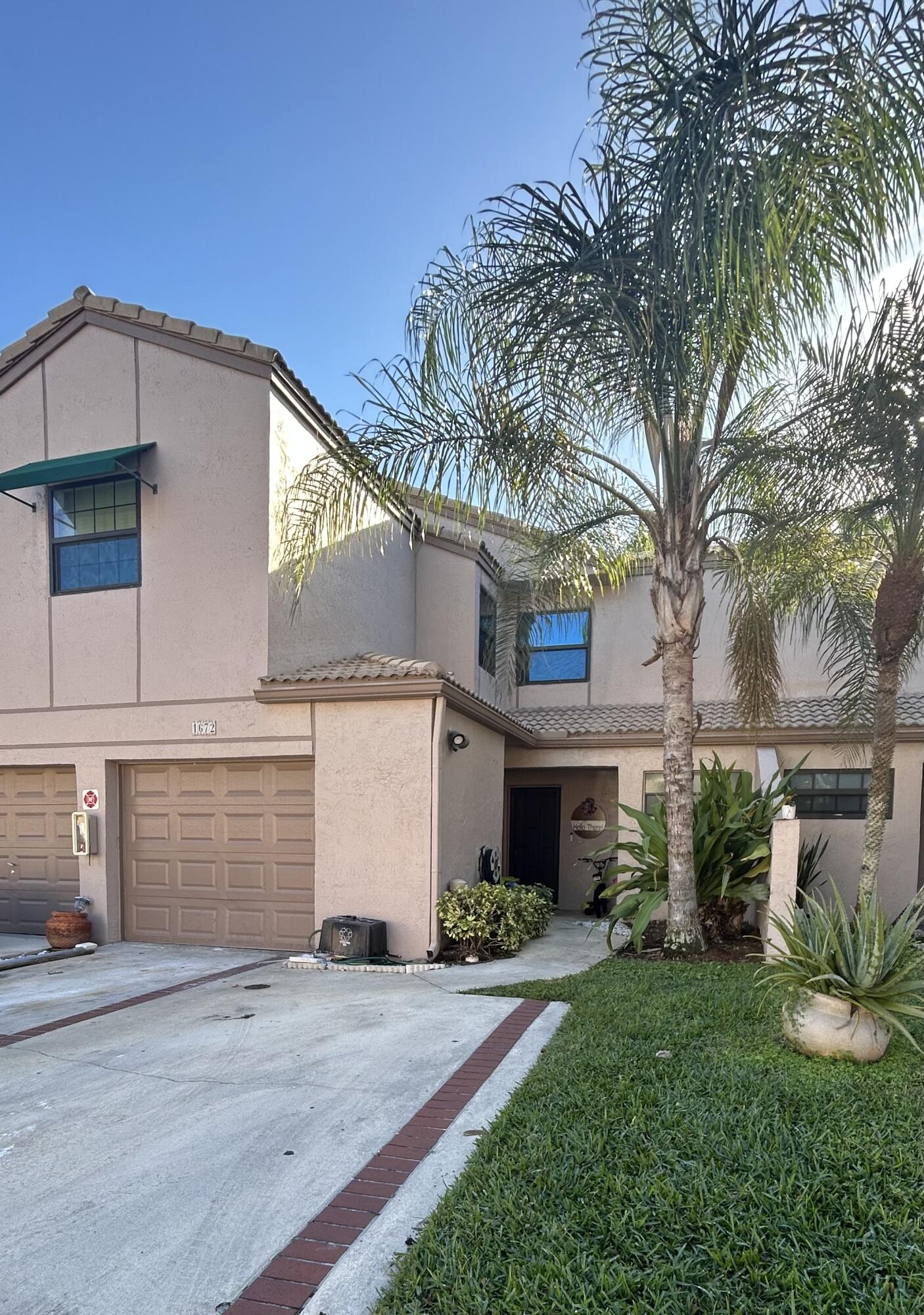MOTIVATED SELLER OFFERING CONCESSIONS TOWARDS HOA FEES!!! Come see this remodeled 2/2 first-floor condo in a well-maintained community. This beautiful unit features a W/D, stainless steel appliances, quartz countertops, NEST system, garage with electric car hookup, and two driveway parking spaces. A/C & WATER HEATER 2023. Located just steps from the community pool, this pet-friendly property offers easy, low-maintenance living. HOA includes roof and exterior maintenance, building insurance, lawn care, water, sewer, trash, and well-funded reserves.  Close to parks, pickleball, tennis, shopping, dining, top-rated hospitals, golf courses, and the Coral Springs Center for the Arts. Comfort and convenience await. Make it yours today!
