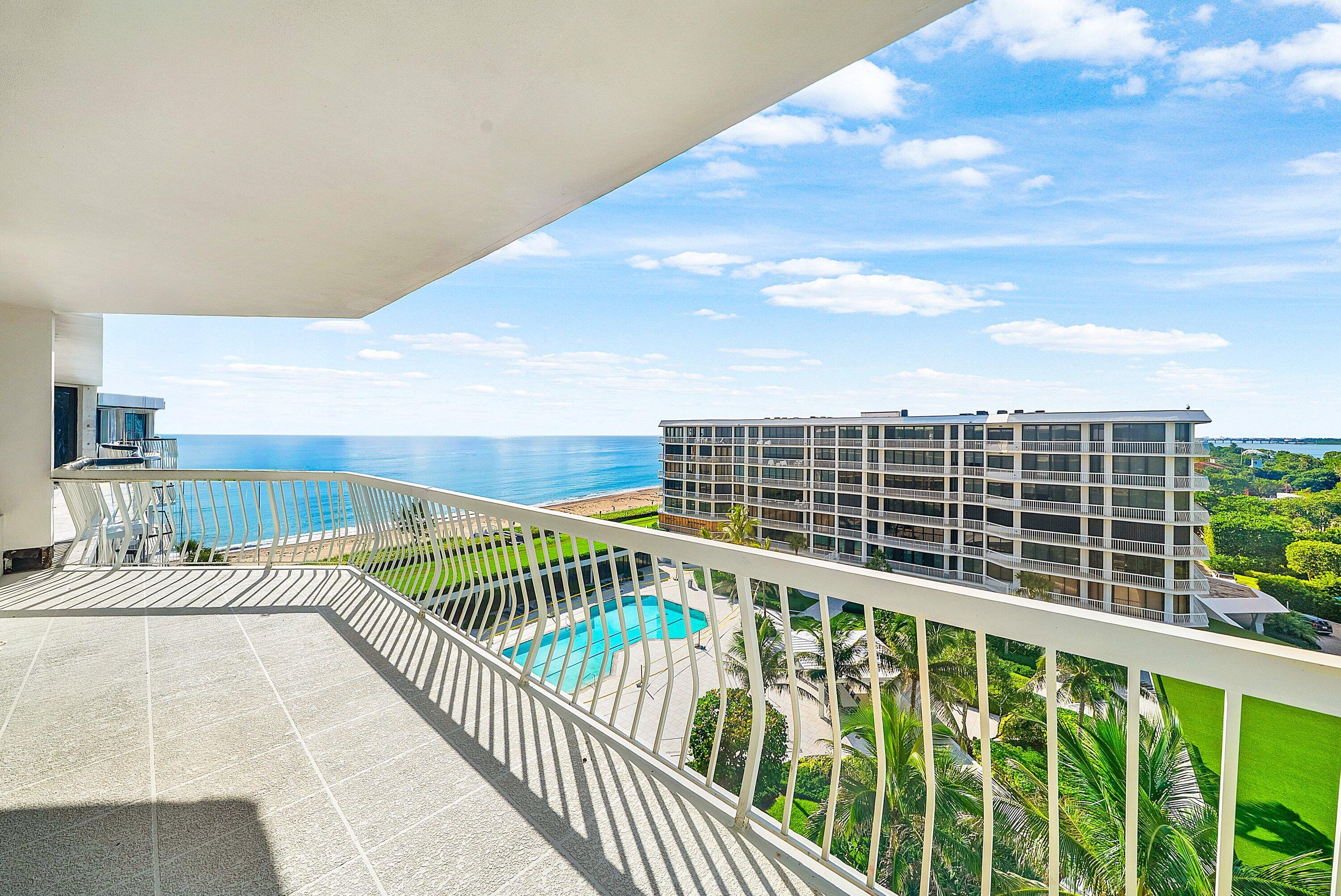Rarely available southwest corner Penthouse! Exceptional 3-bedroom, 3.5 bath residence at the highly sought-after 2100 Sloans Curve. Enjoy expansive Intracoastal views from the living, dining, and guest areas, and captivating Ocean views from the Primary Suite. A gracious entrance foyer opens to expansive living spaces with soaring ceiling heights and abundant natural light. All bedrooms feature en-suite baths and walk-in closets. Notable features include impact sliding doors, motorized shades, marble floors, kitchen and baths, custom cabinetry, lighting & generous storage throughout. Newly imagined 2100 Sloans Curve is a premier full service building offering resort-like amenities including 24/7 gatehouse, concierge, heated pool/spa, fitness center, Har-Tru tennis, and 2-car garage.