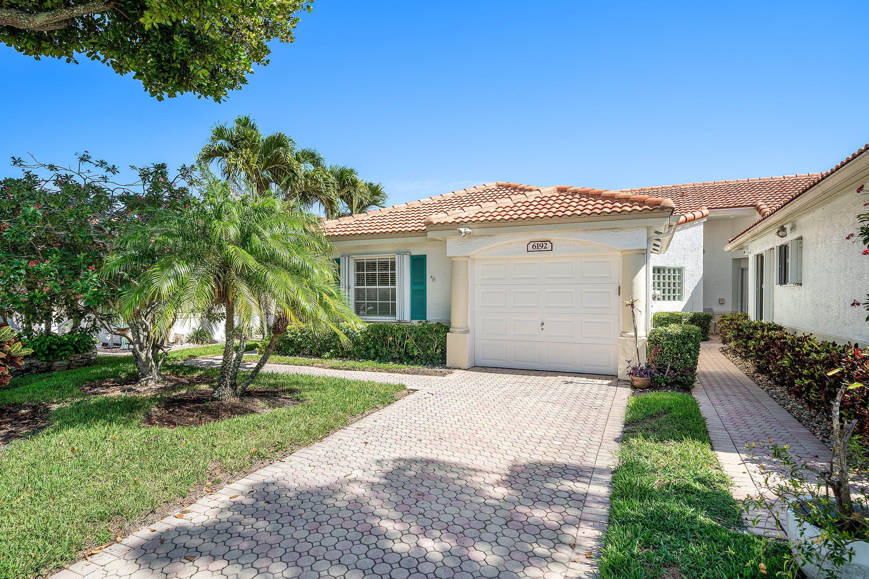 Enjoy living in highly sought out Floral Lakes with water views!  Home boosts large newly updated kitchen, two generous sized living areas;  a huge air-conditioned Florida Room and large living room/flex space. Garage parking and 2nd bedroom and bathroom complete the home.  Floral Lakes has a beautiful Club House with large pool, hot tub and sauna, Gym, Arts & Crafts.  Billiards room, Library and Card Room.  Very active social clubs can fill your calendar if you like.  Floral Lakes is convient to everything!   Information is deemed to be reliable but not guarenteed.