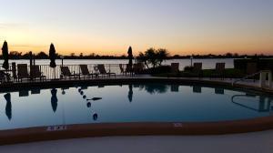 OFF SEASON & EARLY SEASON RENTAL:  $4500 JUNE-SEPT/$7500 OCT-DEC 2026 ENORMOUS WRAP TERRACE FACING EAST, NORTH AND WEST WITH VIEWS OF THE FOUR SEASONS RESORT, THE OCEAN & PEEKS OF THE INTRACOASTAL! CLOSE TO AIRPORT, SHOPPING, RESTAURANTS, PAR 3 GOLF & ACROSS FROM THE BEACH ! TENANT PAYS TOURIST TAX IF APPLICABLE