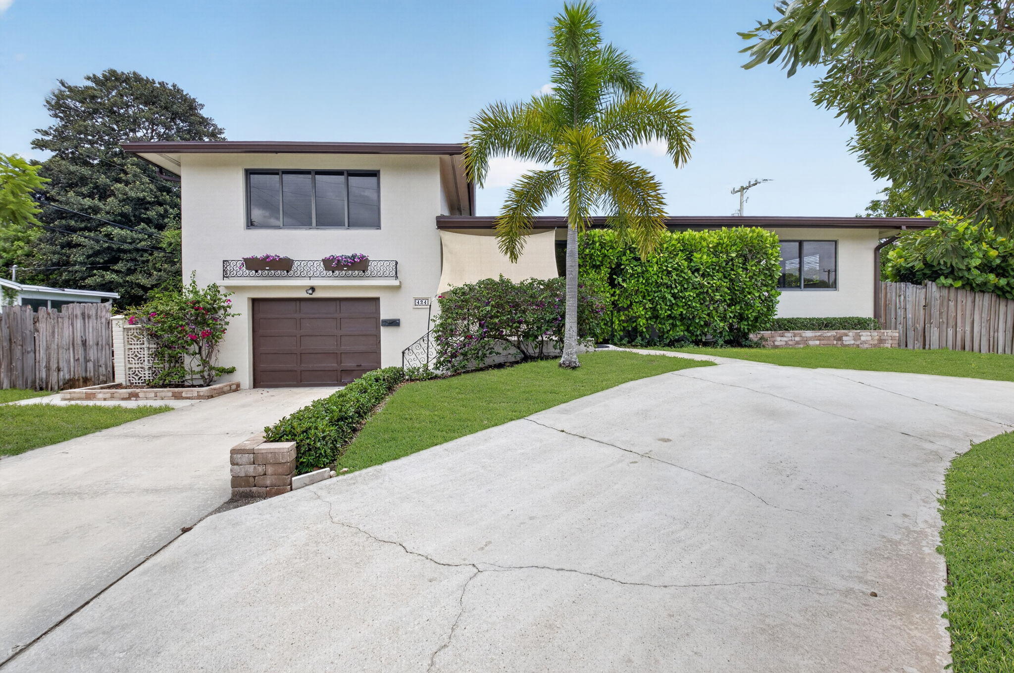 Rare opportunity on an oversized 10,860-square-foot lot in the heart of East Boca Raton! This 3-bedroom, 2-bath tri-level home offers exceptional potential to renovate, reimagine, or personalize while enjoying one of the area's most desirable locations.  The backyard is the true highlight, featuring a large private pool, expansive outdoor space, and plenty of room to entertain, garden, or simply enjoy the South Florida lifestyle. Inside, the unique tri-level floor plan offers character, flexibility, and a solid foundation for your vision.  Major improvements already completed include a 2023 roof and impact windows, providing a valuable head start for future updates. Additional features include a 1.5-car garage, circular driveway, and no HOA.  See more... Located in a highly sought-after A-rated school district, excellent location near easy access to highways, Boca downtown and the beaches.