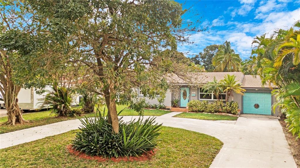 This super cute, Mid-Century Florida bungalow is ready for it’s next long term relationship. Lovingly cared for and recently treated to a new modern kitchen with quartz countertops, and extraordinary cabinet space complete with pull out pantry. Updated bath. A new roof in 2018 and impact windows. The heavy lifting has already been done. A wonderful starter home or place to downsize. The Massive lot provides a tranquil park like yard provides a relaxing escape. Laundry room and loft in garage provide additional storage. Minutes to freeways, airport, beaches, shopping and dining. Walking distance to some of the best donuts around!  Perhaps the most convenient location in South Florida with an easy commute in to Miami or Fort Lauderdale.