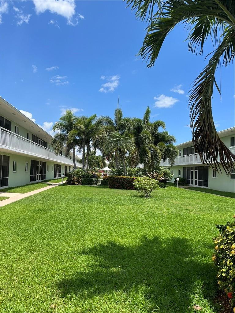 Tastefully renovated first floor 2/2 unit in a 55+ community East of Federal! Ready to move in fully furnished... All the amenities you need..BBQ,clubhouse,heated pool,shuffleboard,laundry room and walk to many shops, grocery stores and restaurants and  close to beach! Screened patio overlooking well maintained garden area. The pool area is enhanced with area for eating, relaxing and entertaining. Cash only, no renting for first 5 years of ownership,unit being sold "as is".