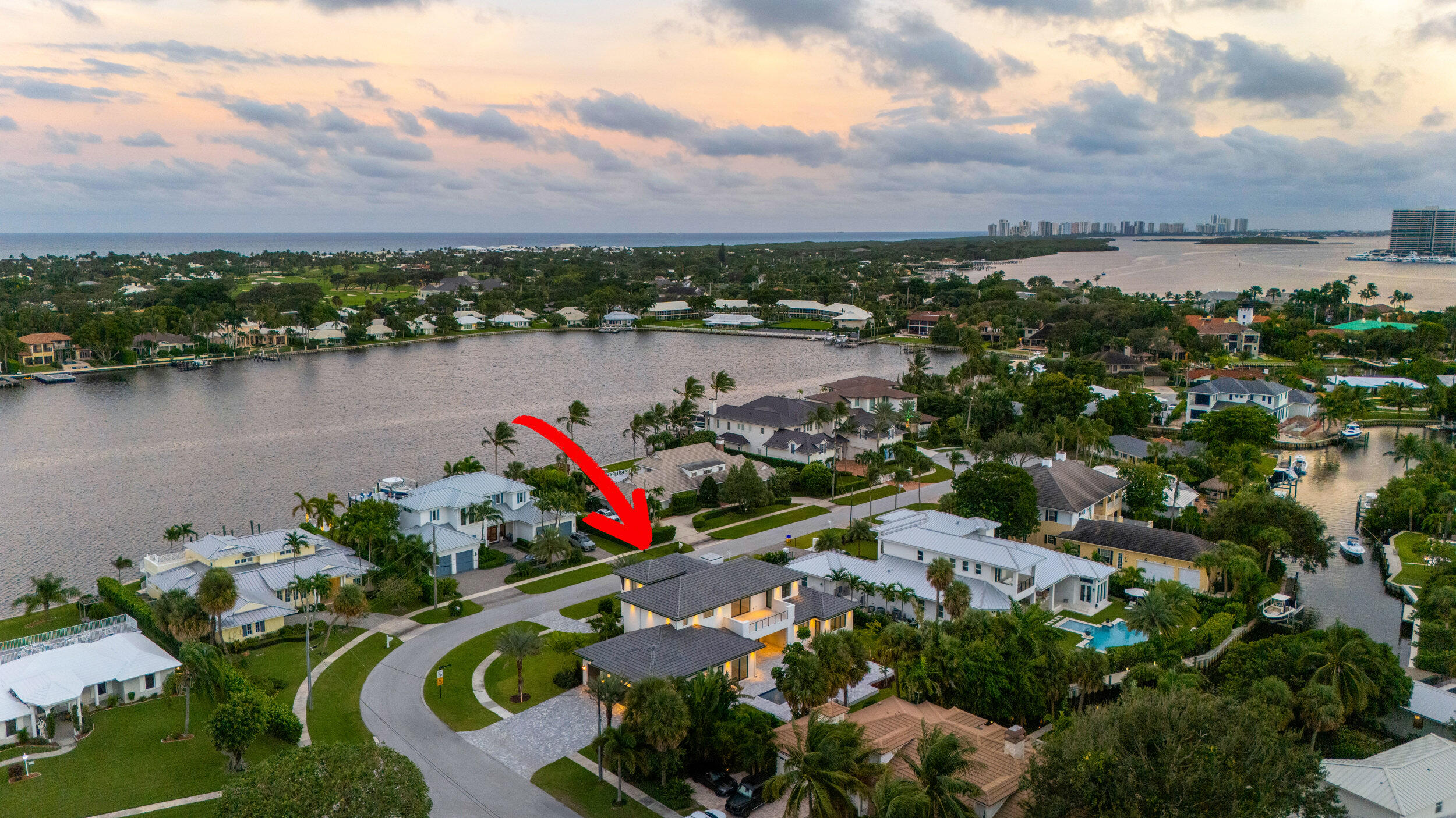 11721 Lakeshore Place, North Palm Beach,
A Singular Masterpiece in North Palm Beach - Where Vision, Engineering, and Uncompromising Craftsmanship Converge.

Welcome to a custom-built legacy estate in the heart of North Palm Beach—where every square foot of this residence reflects intentional design, structural excellence, and luxury without compromise. Situated on a generous lot with a brand-new private boat basin and yard to spare, this two-story home was conceived with the functionality of a discerning owner and executed with the quality mindset of a master builder. The primary suite on the main level anchors a smart and livable floor plan, finished with engineered hardwood floors, floor-to-ceiling tiled showers, custom cabinetry and floating vanities. Every room is a reflection of sophistication, comfort, and practicality.
Construction highlights include: 20-gauge steel studs, 5/8" drywall on all walls and ceilings, and spray foam insulation.Fi-Foil on chase and exterior walls, batt insulation in every wall for unmatched sound attenuation. Gypcrete subfloors and batt insulation between floors. Concrete roof tiles built to withstand Florida's coastal conditions along with Impact-rated windows and doors throughout.
Mechanical and future-ready provisions include: Two tankless water heaters with a recirculating pump, hot water, instantly. Garage prepped for mini split system for future climate control Elevator shaft and generator conduit in place for seamless upgrades. All A/C systems coated and treated for durability in the coastal climate.
The home's technology and systems deliver ease and elegance: Automated lighting control system,Central vacuum, Dedicated Audio/Video closet, the home is Pre-wired for motorized drapes/window treatments, Chandelier motorized to lower for safe, easy cleaning, Wood blocking for all TV mounts and cabinetry installs. Exceptional lighting provisions throughout the entire home
Exterior living is just as intentional, with soffit lighting to highlight the home's architectural beauty, a vented outdoor kitchen, and a 16x36 custom pool with sun deck and spa, ideal for Florida living year-round.
This home offers unparalleled storage, layered infrastructure, and a deep understanding of what makes a home livable and lasting. From concept to execution, no corner was cut, no detail overlooked.
This is not a spec. This is a statement. Built once. Built right.
