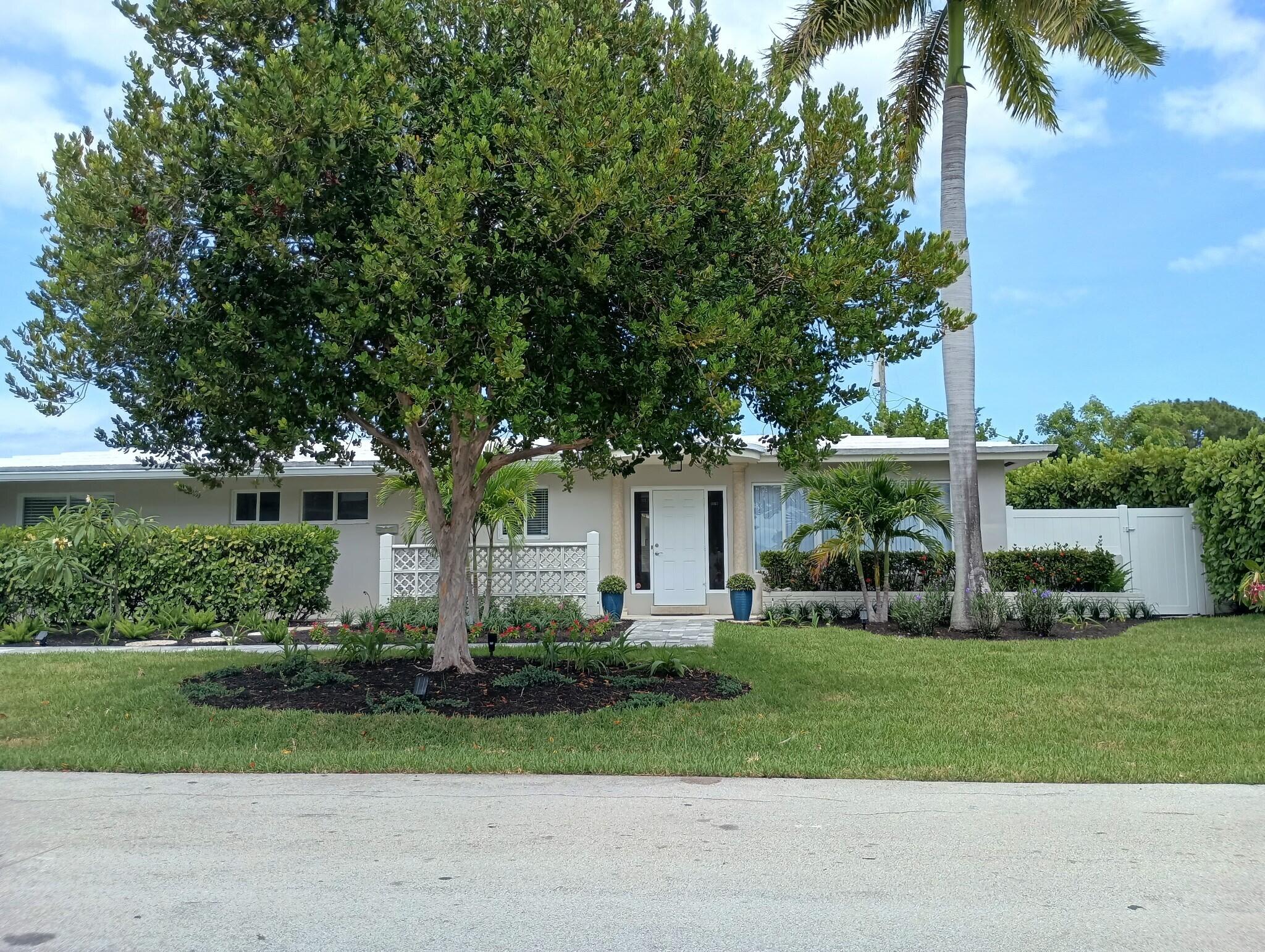 RENOVATED 3 BEDROOMS 2 BATH SINGLE FAMILY HOME. BRIGHT, OPEN FLOORPLAN WITH VERY SPACIOUS ROOMS. SPLIT BEDROOMS, IMPACT GLASS WINDOWS. CERAMIC TILE FLOORING THROUGHOUT, REMODELED KITCHEN WITH LOTS OF CABINETS AND GRANITE COUNTERTOP. WASHER /DRYER IN GARAGE. CIRCULAR DRIVEW AY. FENCED YARD. SITUATED ON LARGE CORNER LOT ACROSS FROM INTRACOASTAL. STEPS TO BANKS, SHOPS AND BEACH IN THE CHARMING RESORT TOWN OF LAUDERDALE BY THE SEA.